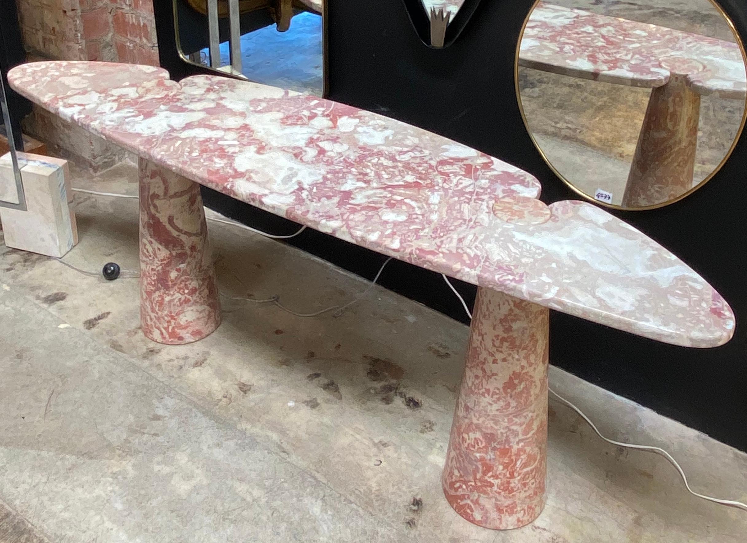 Pink Marble console by Angelo Mangiarotti for Skipper Eros, circa 1971.

The console table is produced by Skipper and is in very good vintage condition.

Designed by Angelo Mangiarotti for Skipper from the 'Eros' series, pink marble console with