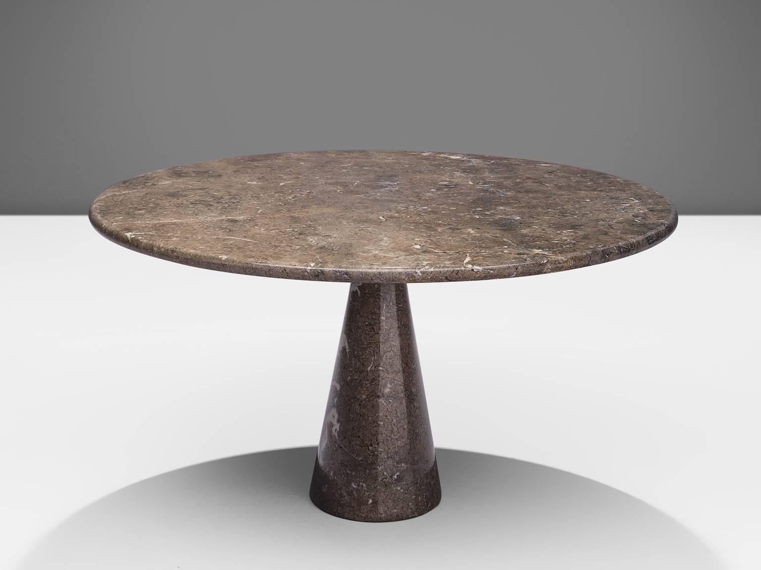 Angelo Mangiarotti for Skipper, table M1, marble, Italy, 1969

This table is part of our midcentury collection. The patterned brown to greyish table has a cone shaped base and a circular top. The circular top rests perfectly on the cone. The