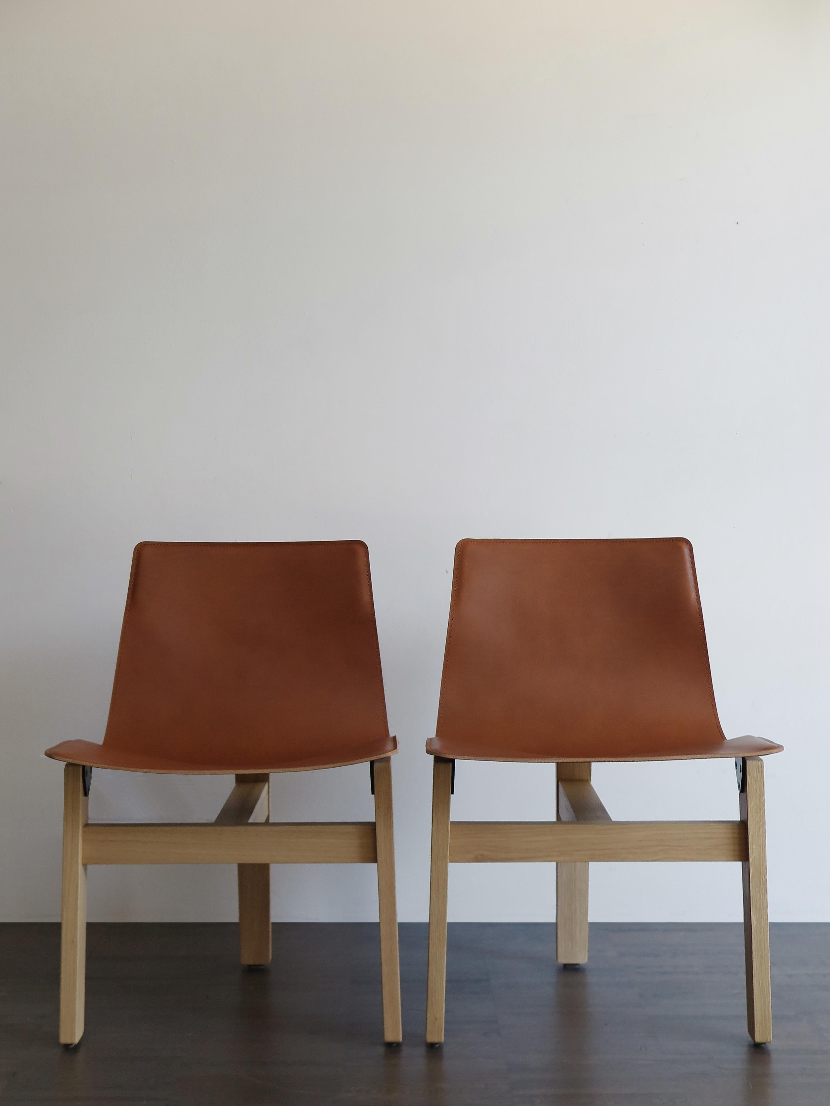 Modern Angelo Mangiarotti Italian Leather and Wood Dining Chairs for Agapecasa For Sale