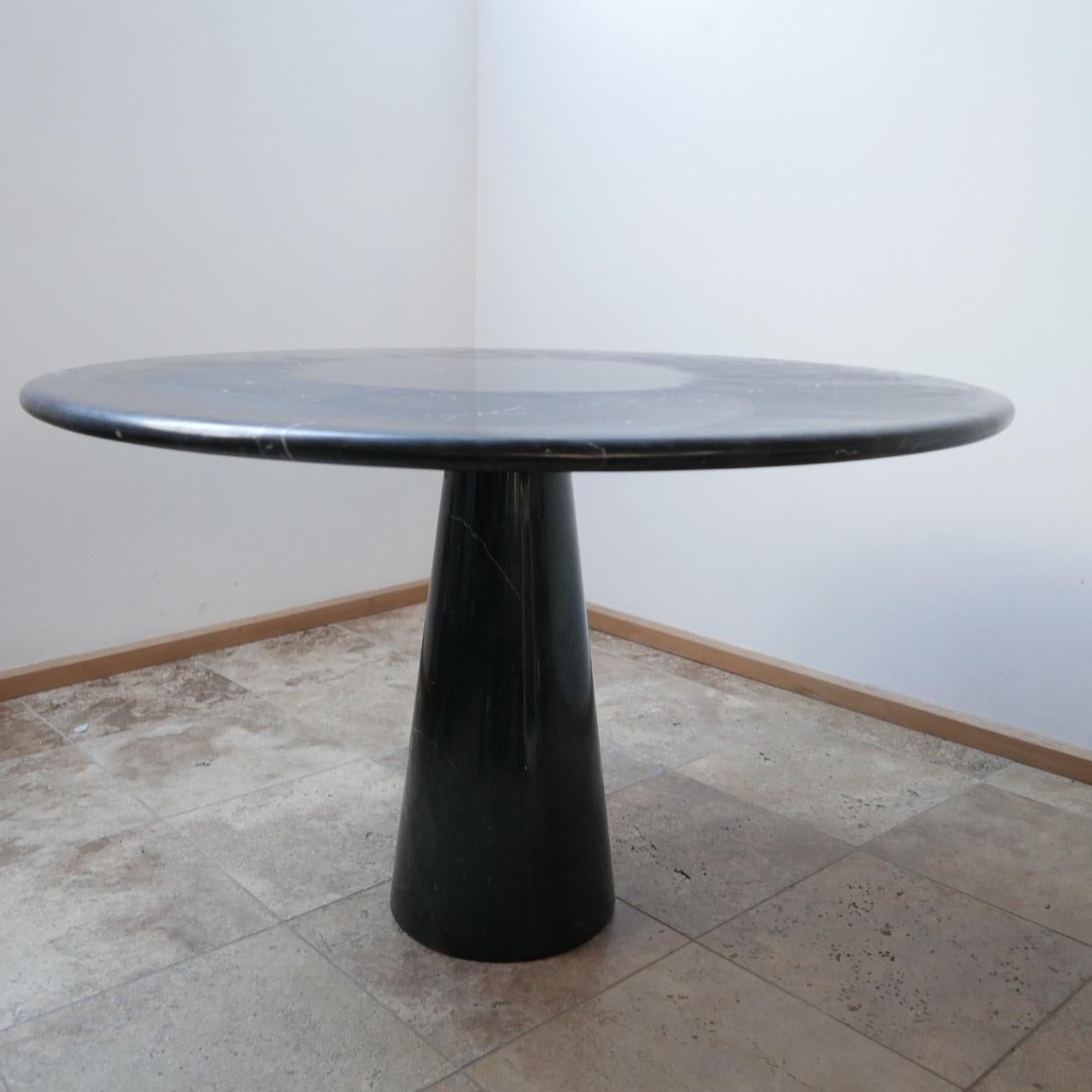 A circular marble table by Angelo Mangiarotti in Nero Marquina,

Italy, circa 1970s.

A well sized table perfect for a smaller room or in the corner of a larger room.

The marble specimen used is good quality and interesting with veins running