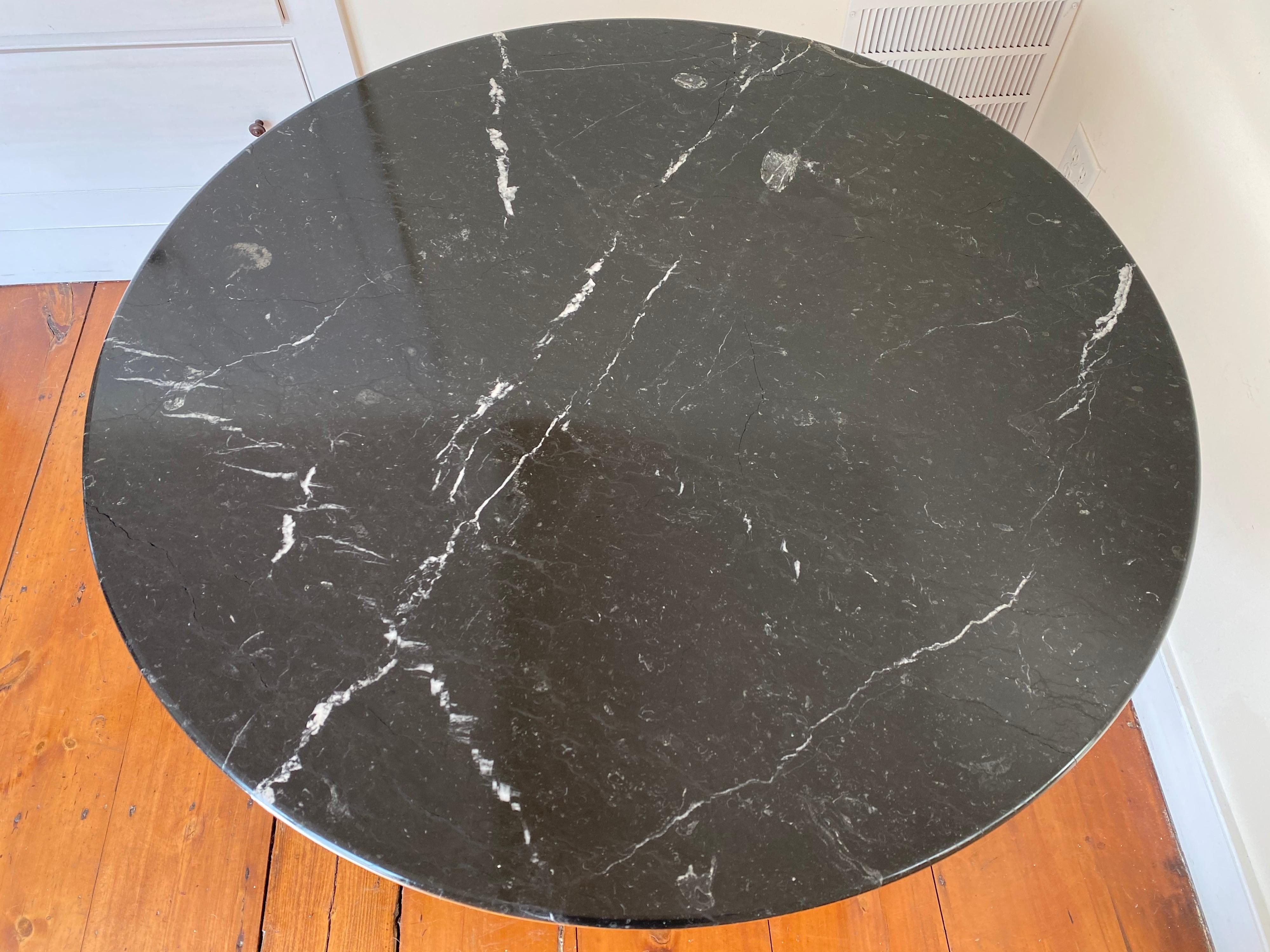 A vintage Angelo Mangiarotti dining table in Nero Marquina marble.