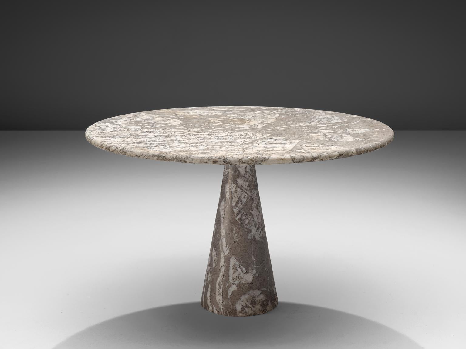 Angelo Mangiarotti, pedestal table, marble, Italy, 1970s

This patterned grey to white table is designed by Italian Angelo Mangiarotti. The circular top rests perfectly on the cone. The design showcases a play of balance and rhythm. The design is