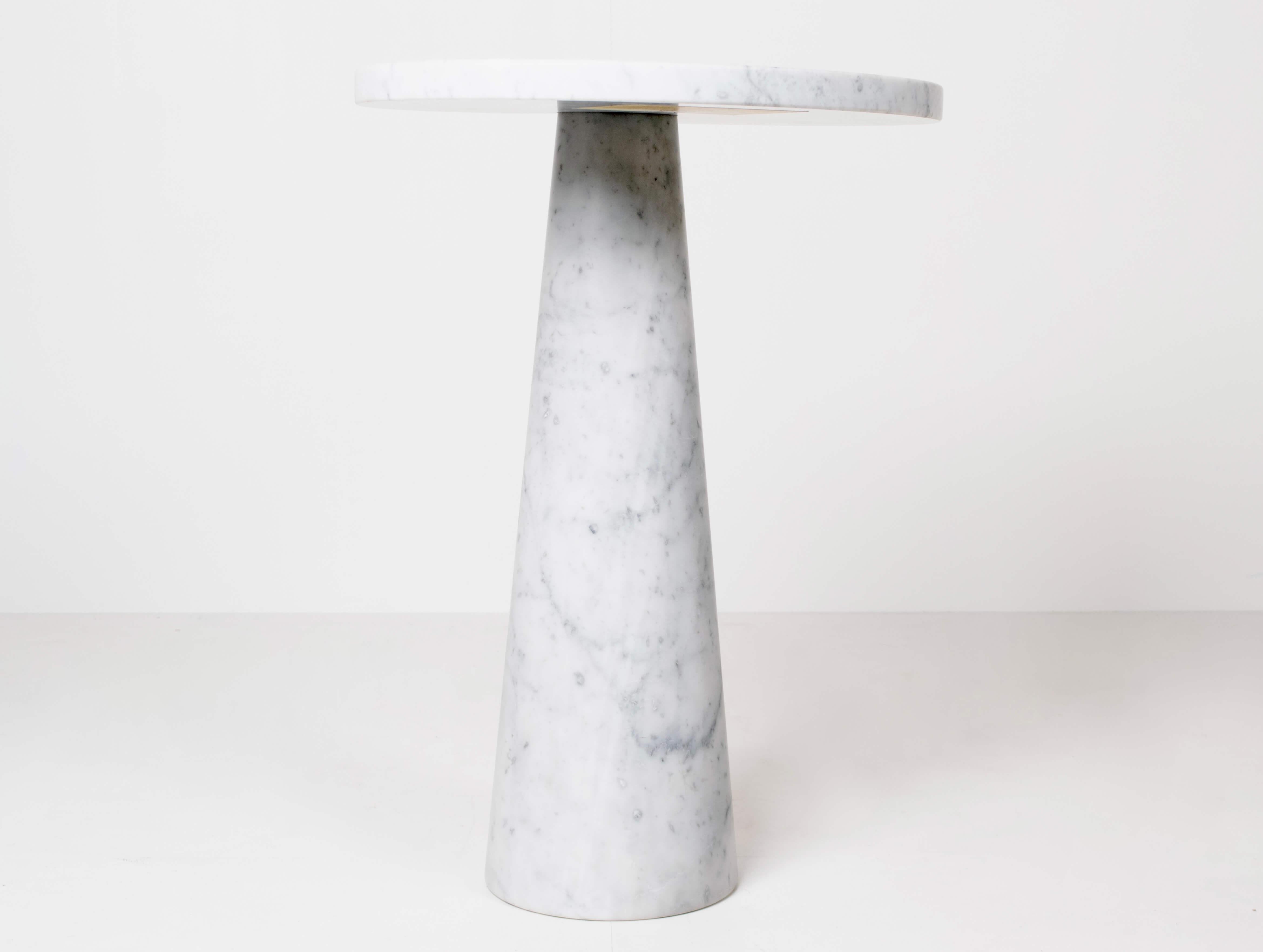Amazing marble side- or coffee table in Angelo Mangiarotti Style from Italy 1970s. This table made of Carrara marble has the similar design as Angelo Mangiarotti's table designed for Skipper from the 'Eros' series. The table consists of a cone
