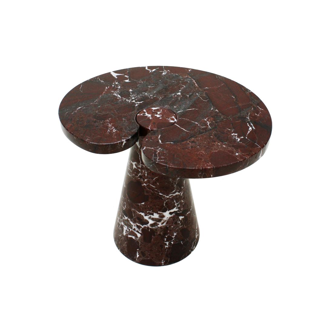 Eros series side table designed by Angelo Mangiarotti, composed of two pieces made of Rosso Levanto marble, Italy, 1970s.

Angelo Mangiarotti was born in Milan on 26th of February 1921.

He graduated in Architecture in 1948 at Politecnico di