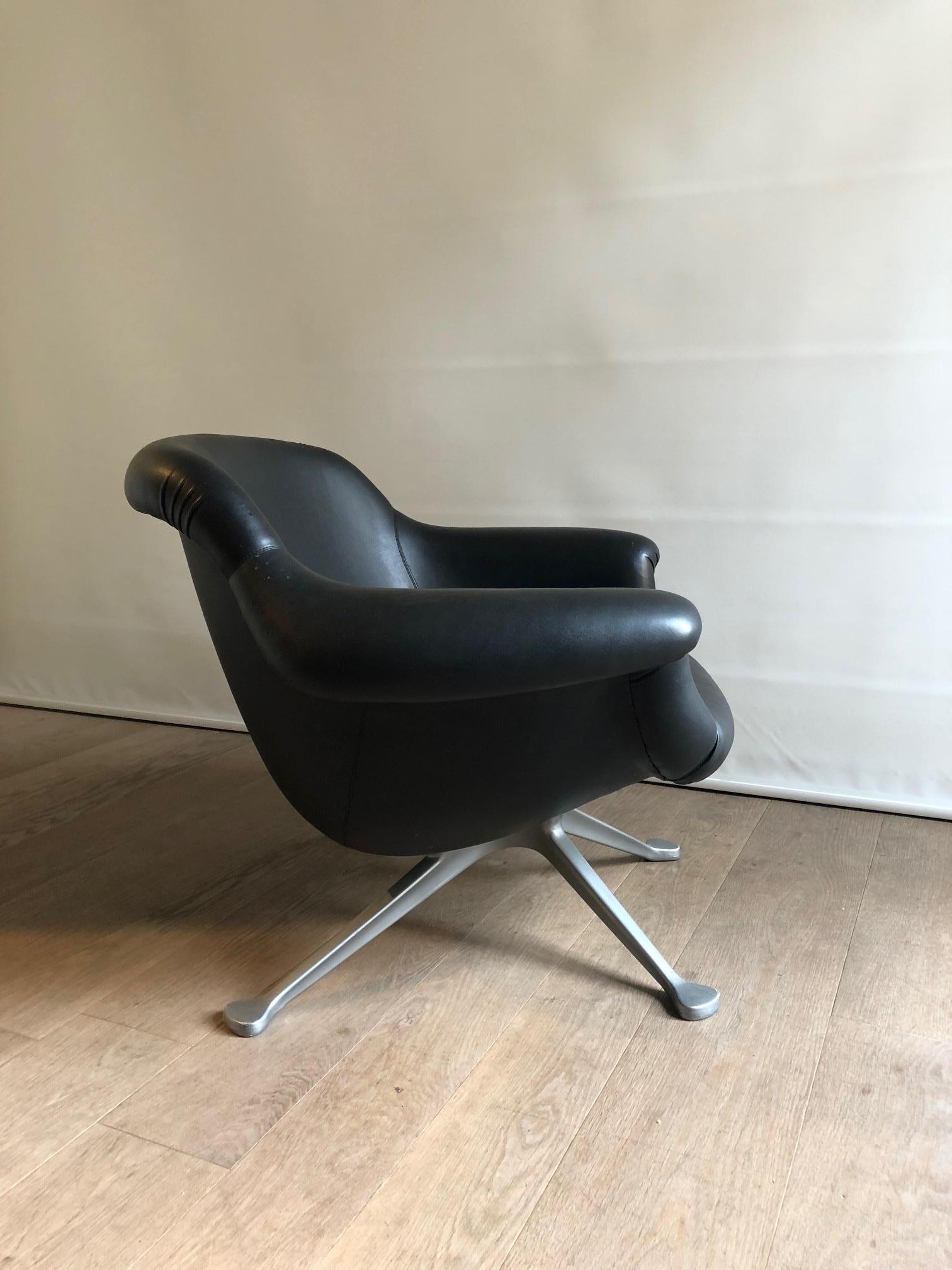 Rare lounge chair model 1110 designed by Angelo Mangiarotti for Cassina, Italy in the 1963.

Cast-aluminum base and mold-injected foam seat with the original black fake leather upholstery.

Literature: 1) Domus Magazine, June 1963; 2) Repertorio