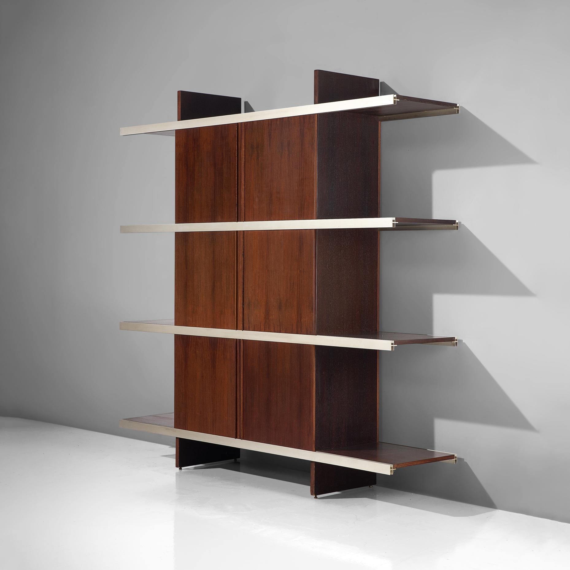 Angelo Mangiarotti for Poltronova, cabinet/bookcase from the multiuse series, exotic wood, aluminum, Italy, 1960s.

Beautiful bookcase/sideboard of the multiuse series that Mangiarotti designed for Poltronova. Multiuse series stands for versatile