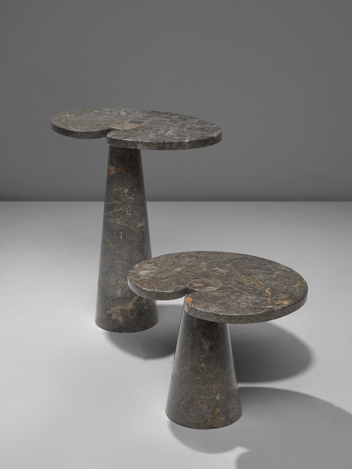 Angelo Mangiarotti, cocktail tables in grey marble, Italy, 1970s. 

These sculptural tables by Angelo Mangiarotti are a skillful example of postmodern design. The lotus leaf like side table features no joints or clamps and is architectural in its