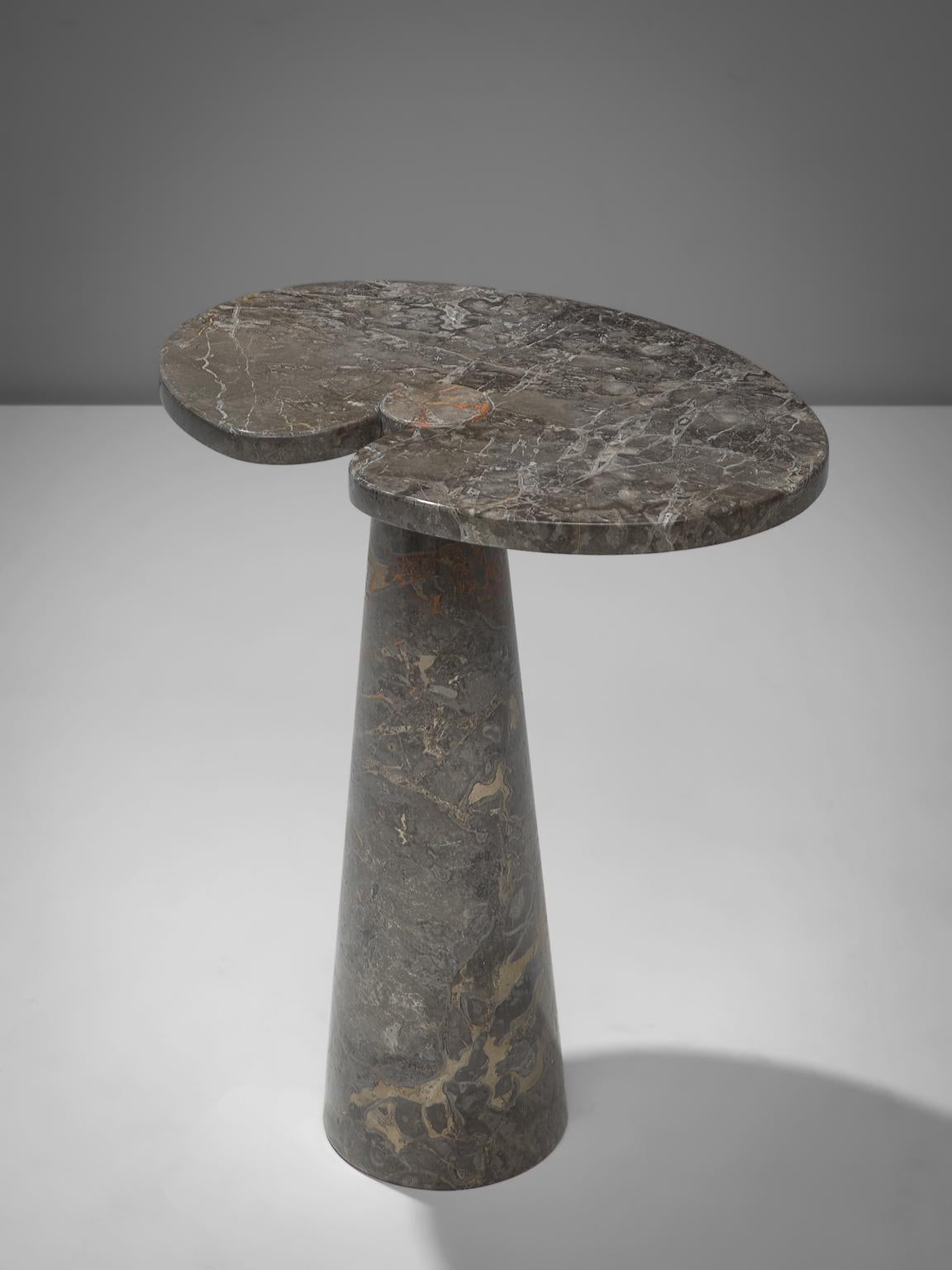 Angelo Mangiarotti, Cocktail Table in grey marble, Italy, 1970s. 

This sculptural table by Angelo Mangiarotti is a skillful example of postmodern design. The lotus leaf like side table features no joints or clamps and is architectural in its