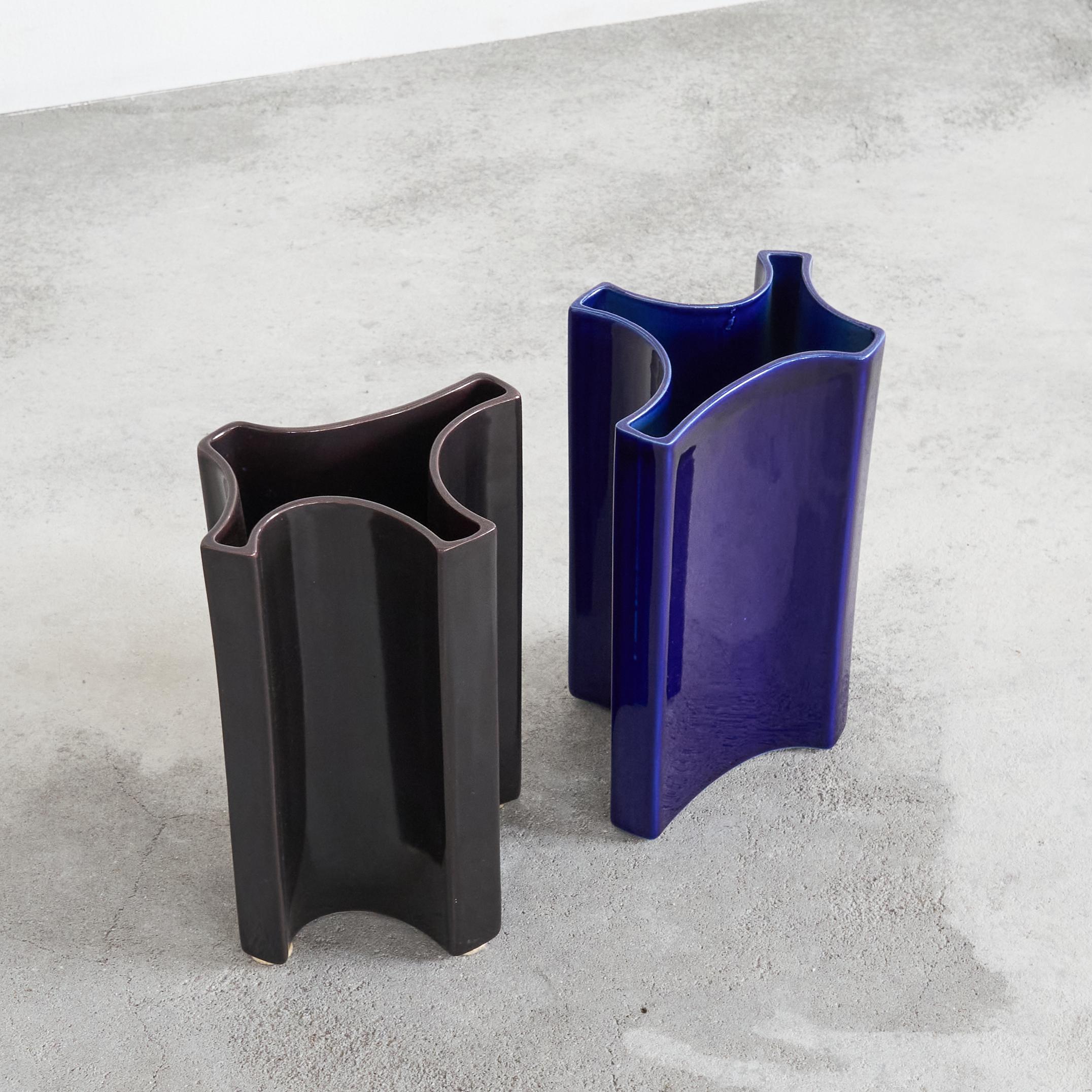 Fantastic pair of freeform vases by Angelo Mangiarotti (1921 – 2012) for Fratelli Brambilla Milano, 1960s, Italy.

Mangiarotti was a multi talented man and one of the great designers of the 20th century. He is known for his marble tables and