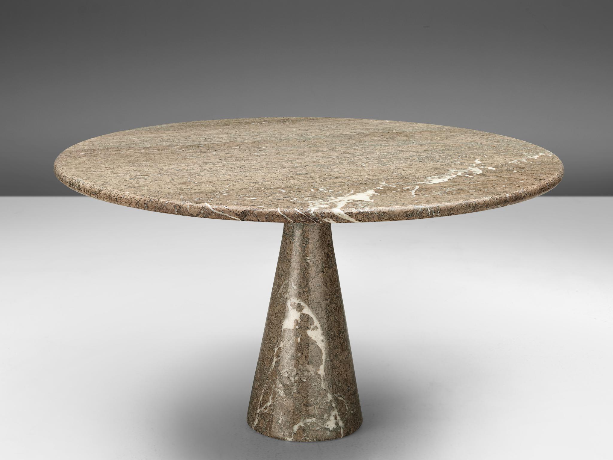 Angelo Mangiarotti, pedestal dining table, marble, Italy, 1970s

This grey marble table is designed by Italian Angelo Mangiarotti. The circular top rests perfectly on the cone. The design showcases a play of balance and rhythm. The design is