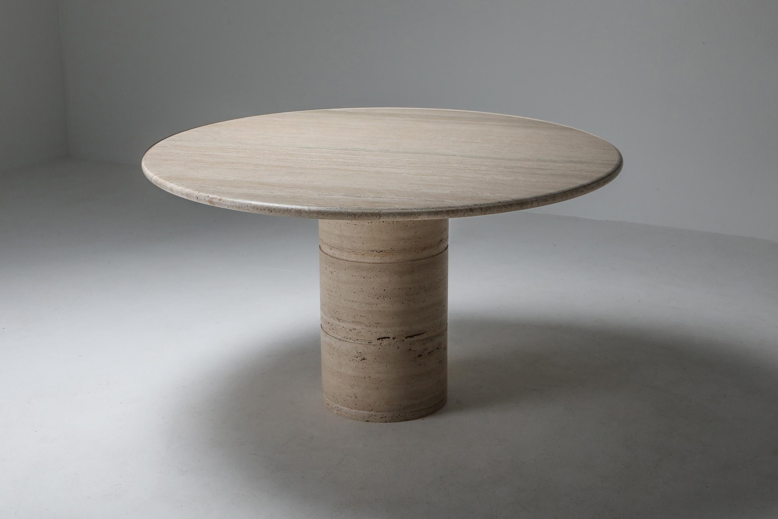 Skipper, Angelo Mangiarotti, travertine, Italy, 1970s.
Nude travertine dining table with a round edged top mounted on a cylindrical column base consisting of three parts. Simple Postmodern design with a very natural feel to it.

 