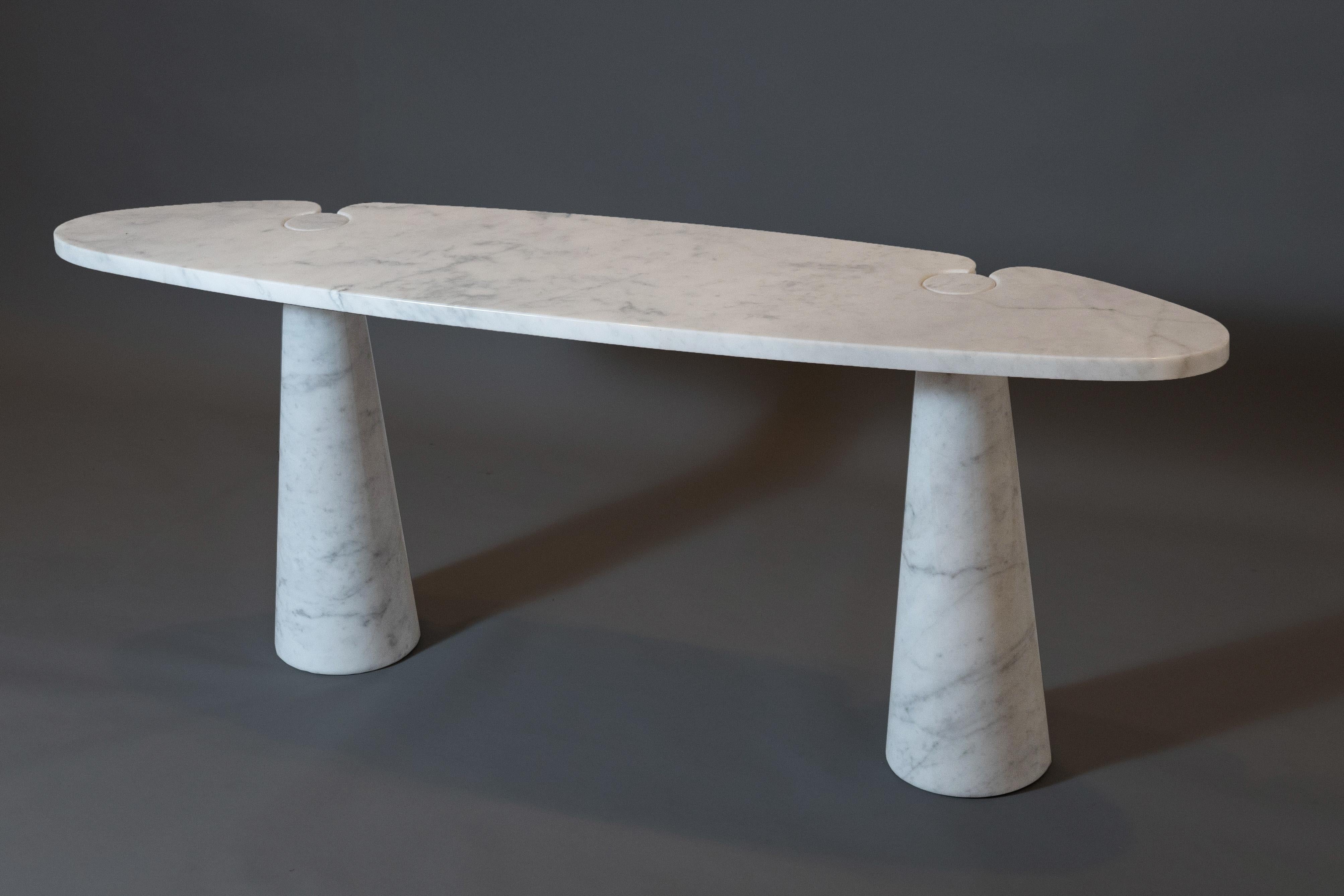 Angelo Mangiarotti (1921 - 2012) 

A beautiful Eros console by Angelo Mangiarotti for Skipper, in thick white Carrara marble with subtle grey veining. A large ovoid top with a flat back and elliptical front is ingeniously incised with two delicate
