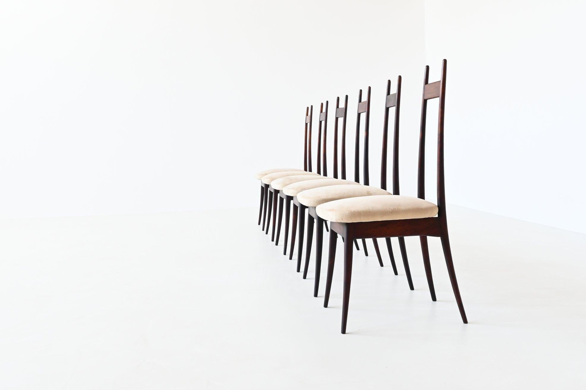 Stunning set of six dining chairs designed by Angelo Mangiarotti for Frigerio, Italy 1959. These amazingly shaped chairs are made of beautiful grained solid Brazilian rosewood and the seats are upholstered with crème-white suede fabric. This model
