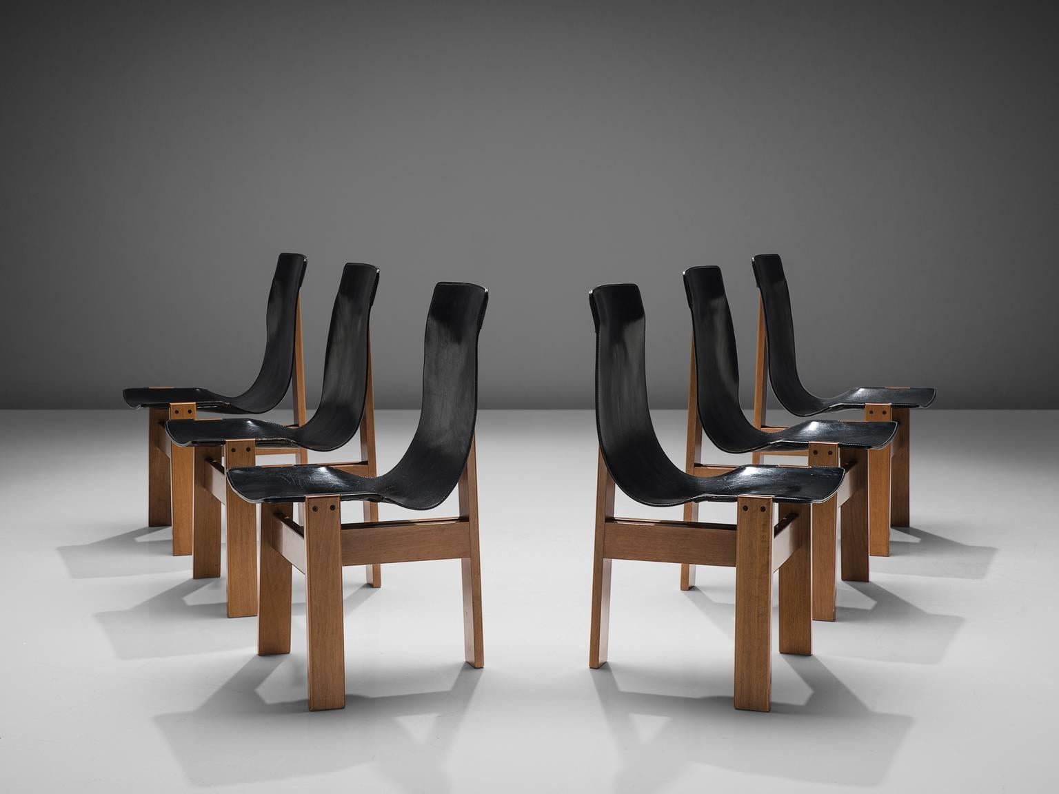 Angelo Mangiarotti for Skipper, set of eight chairs model 'Tre 3', walnut and black leather, Italy, 1978.

Interesting set of six dining chairs by Italian designer Angelo Mangiarotti. The basic frame consist of three walnut planks, combined with