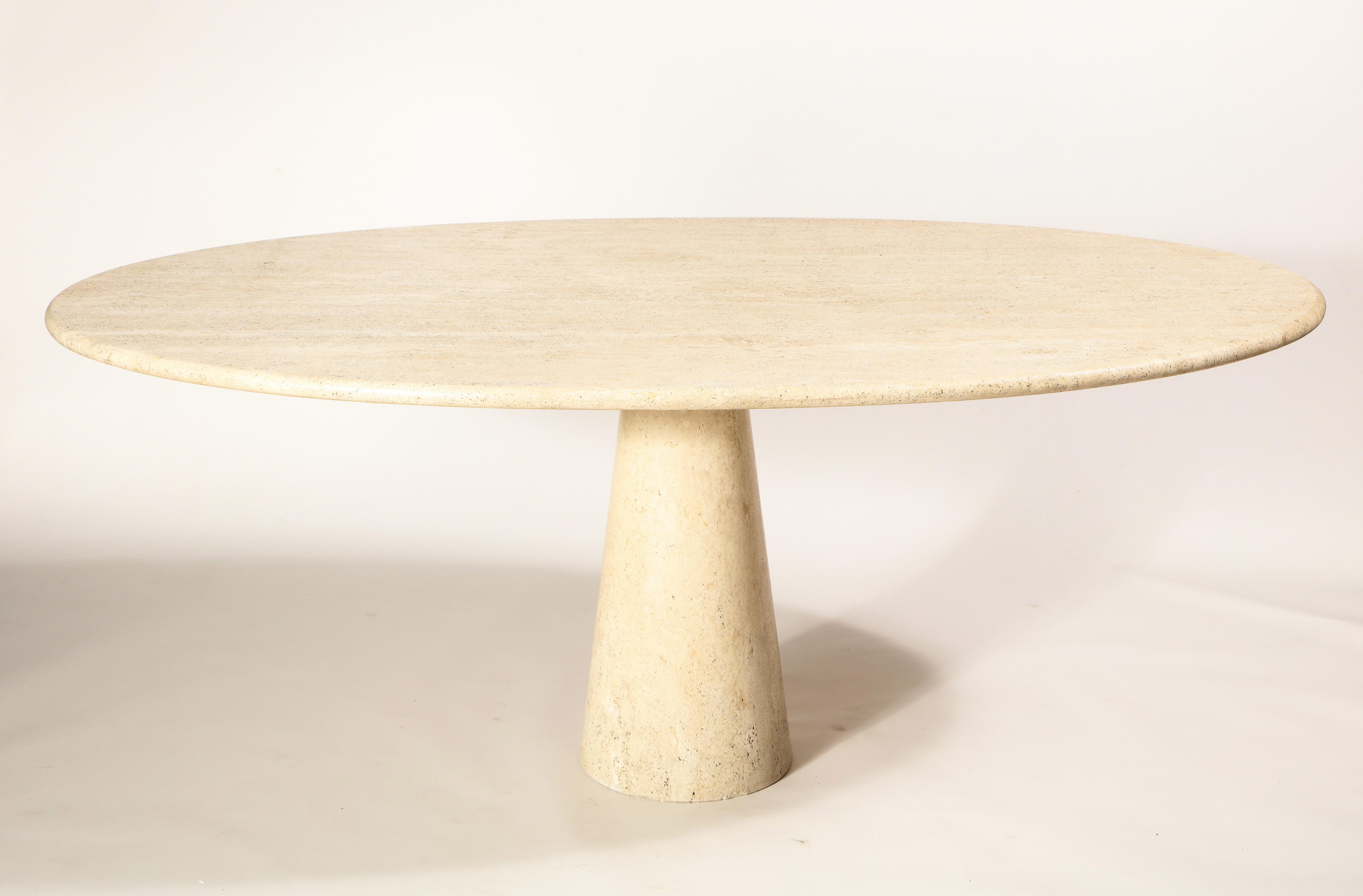 Angelo Mangiarotti style travertine marble oval dining table.

     