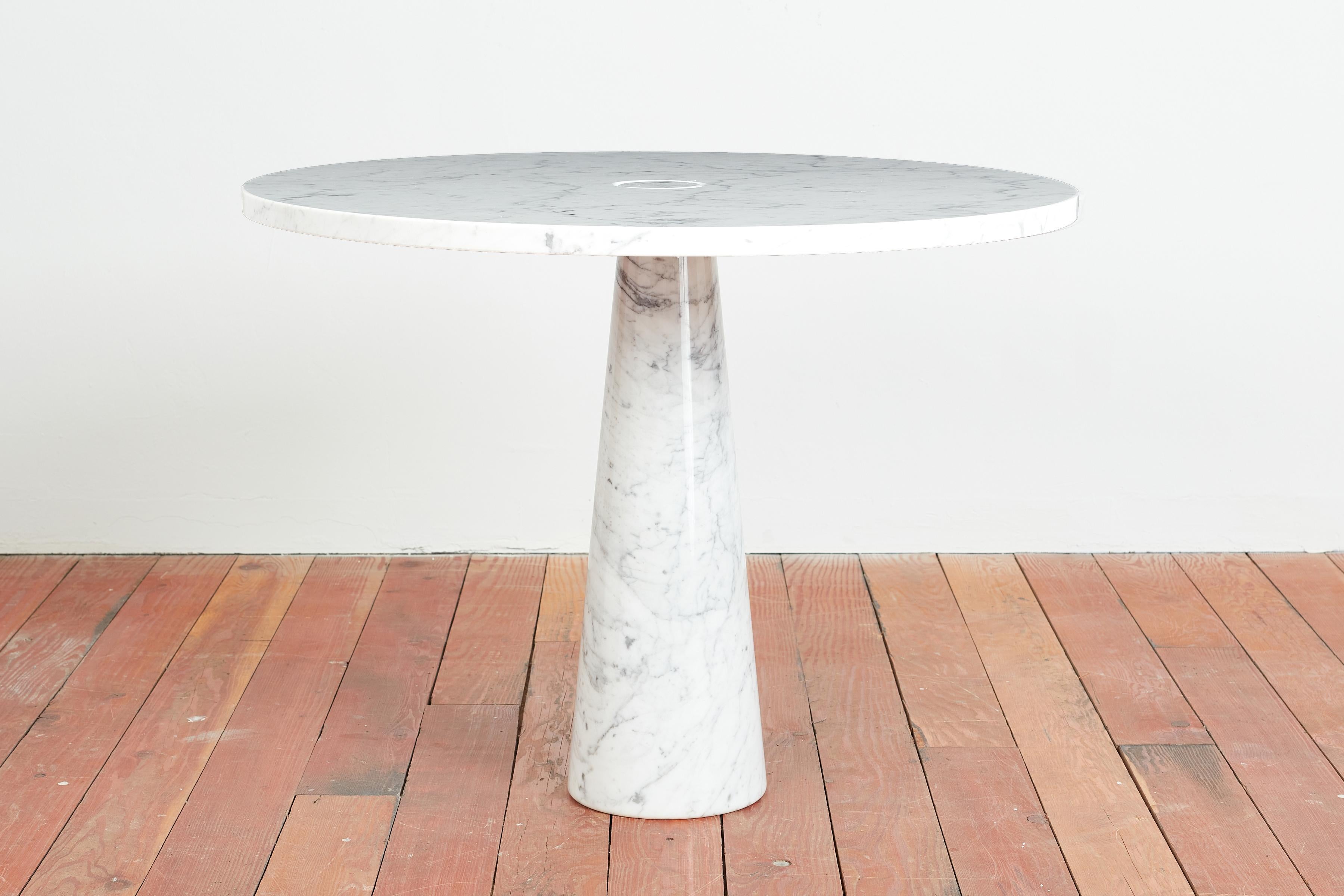 Round table by  Angelo Mangiarotti for Skipper
Italy, 1970s
Original Skipper label 
Solid Carrara marble pedestal base with marble top 
Great as a center table or petite breakfast nook.