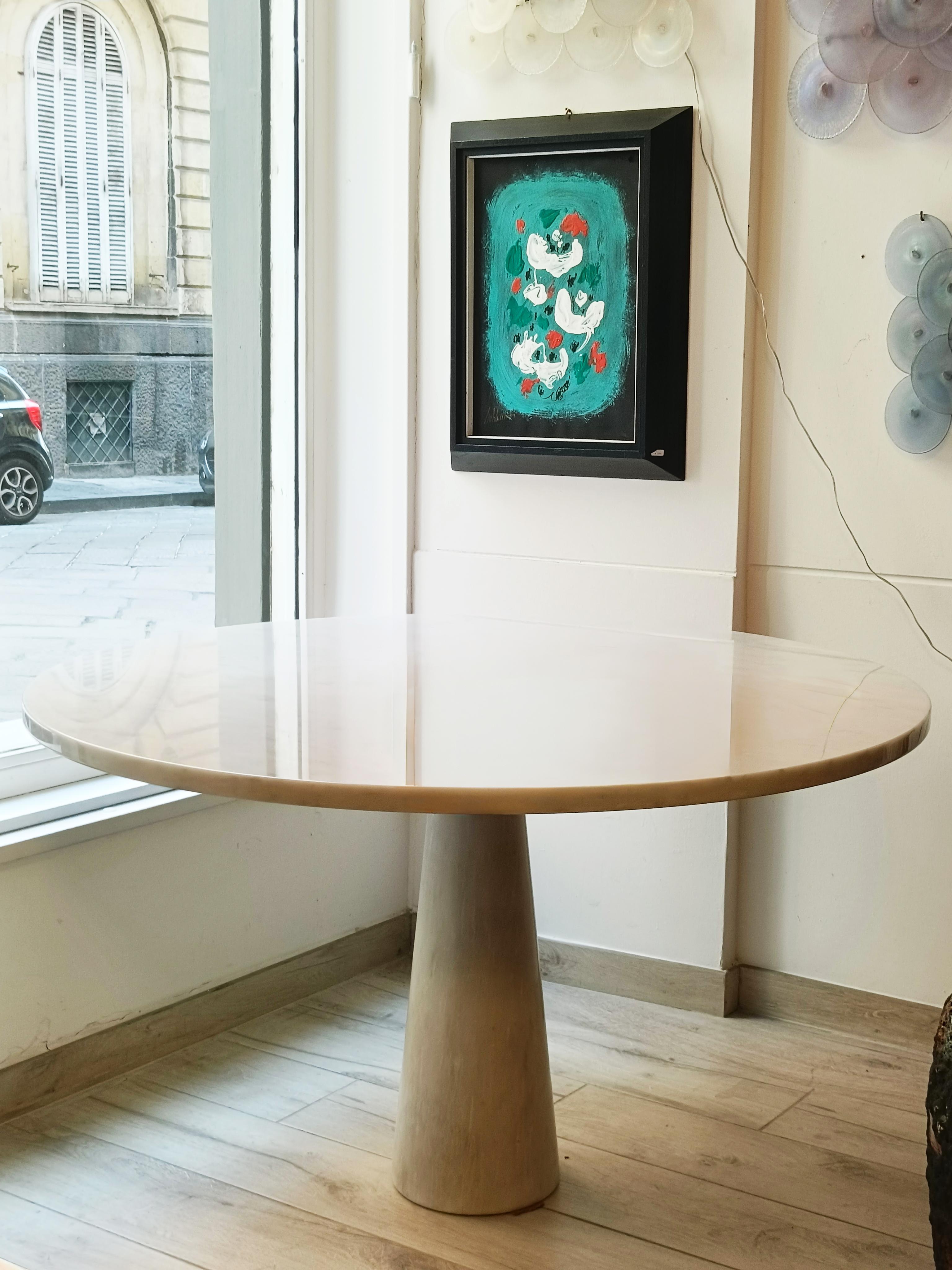 Known for his mastery of combining structural logic with visual harmony, Mangiarotti designed this piece in such a way as to be free of mechanical joints: the round top rests perfectly on the conical base, secured only by weight and precision. The
