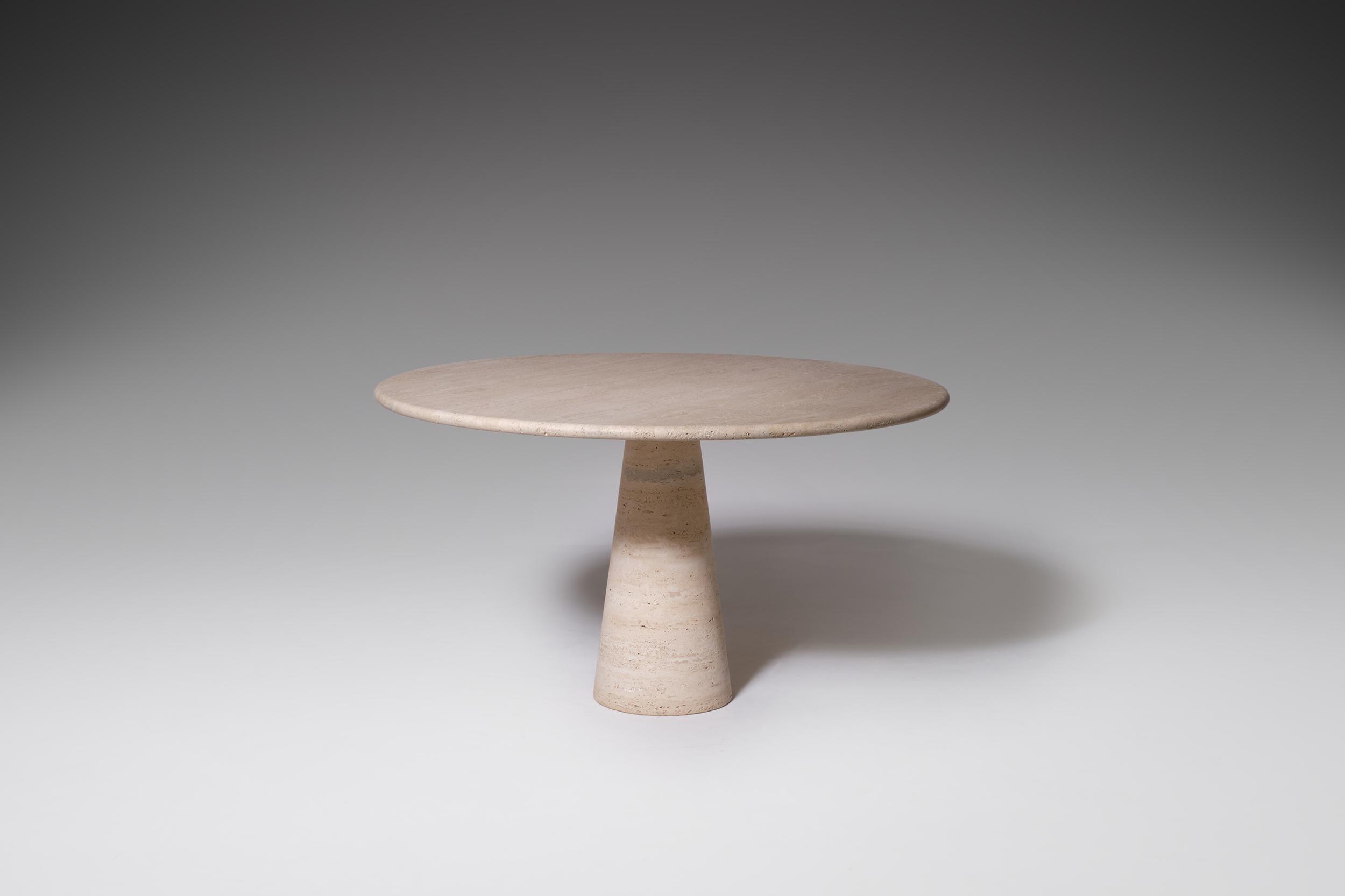 Mid-Century Modern travertine dining table by Angelo Mangiarotti for Skipper, Italy, 1970s.
The round table top is perfectly balanced and rests elegantly on an almost sculptural shaped diablo pedestal base, resulting in a near floating appearance.