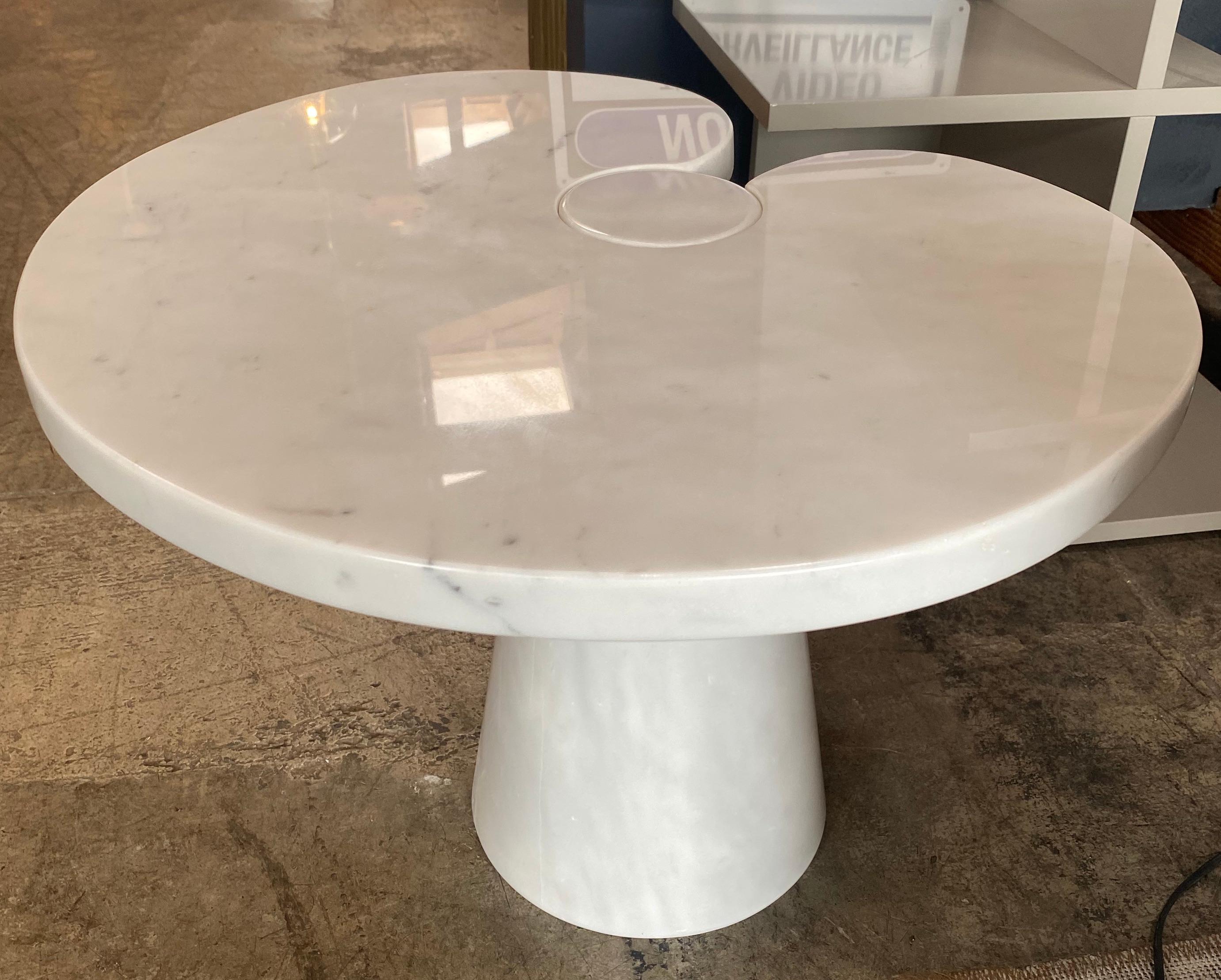 Designed by Angelo Mangiarotti for Skipper from the 'Eros' series, Carrara marble side table with top fitted on conical base. This elegantly organic table has beautiful subtle veining throughout and is from the original 1971 production for Skipper,