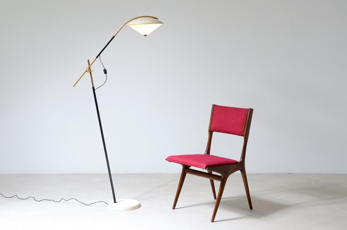 COD-Z130
Angelo Ostuni

Elegant floor lamp with adjustable arm, metal and glass hat and diamond cut marble base.

Oluce Milano, Italian manufacture 1950's.

150 x 40 dia base 25 cm