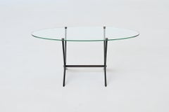 Tavolino ovale Angelo Ostuni in metallo e vetro Italia 1950