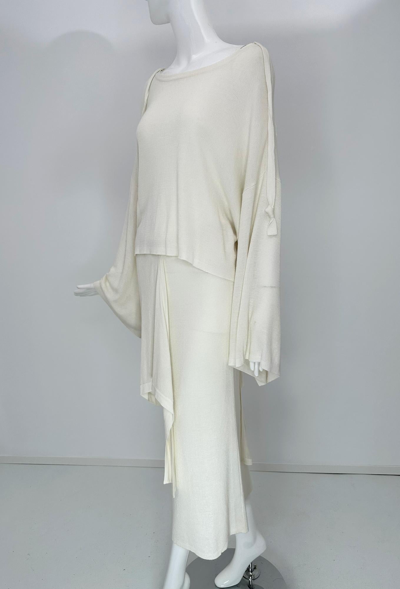 Angelo Tariazzi, Paris 2pc off white knit kimono sleeve, over size off the shoulder top & hip tie pencil skirt from the 1980s. Oversize rayon knit pull on cropped top, sweater weight knit, bateau neckline to wear off the shoulder. Dropped shoulders
