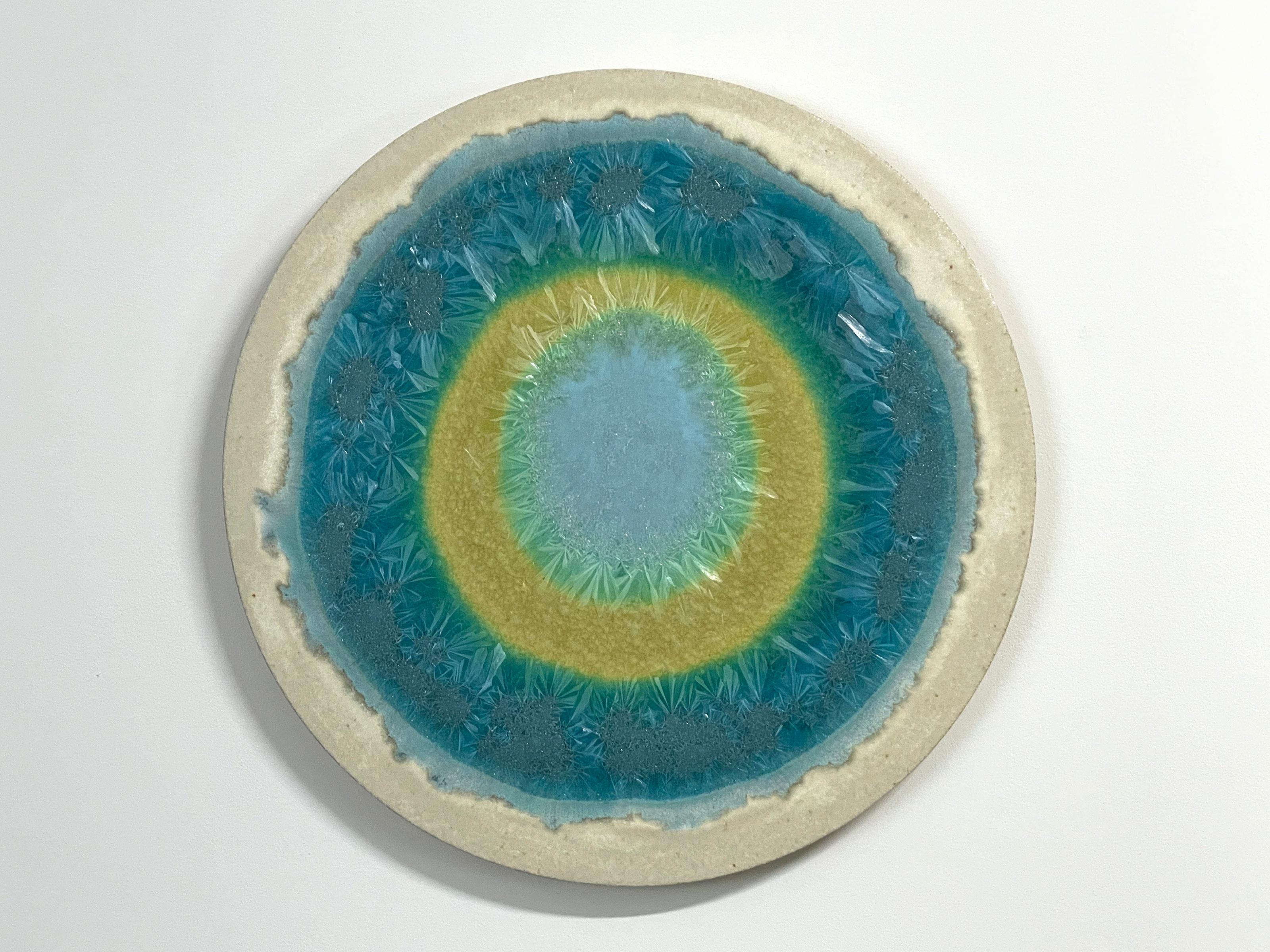 Angel's Tear
Ceramic crystal glaze painting by William Edwards
Hand rolled earthenware circular slab with crystal glaze. 

William received his BFA in sculpture from the historic San Francisco Art Institute and his MFA from UC Davis. William