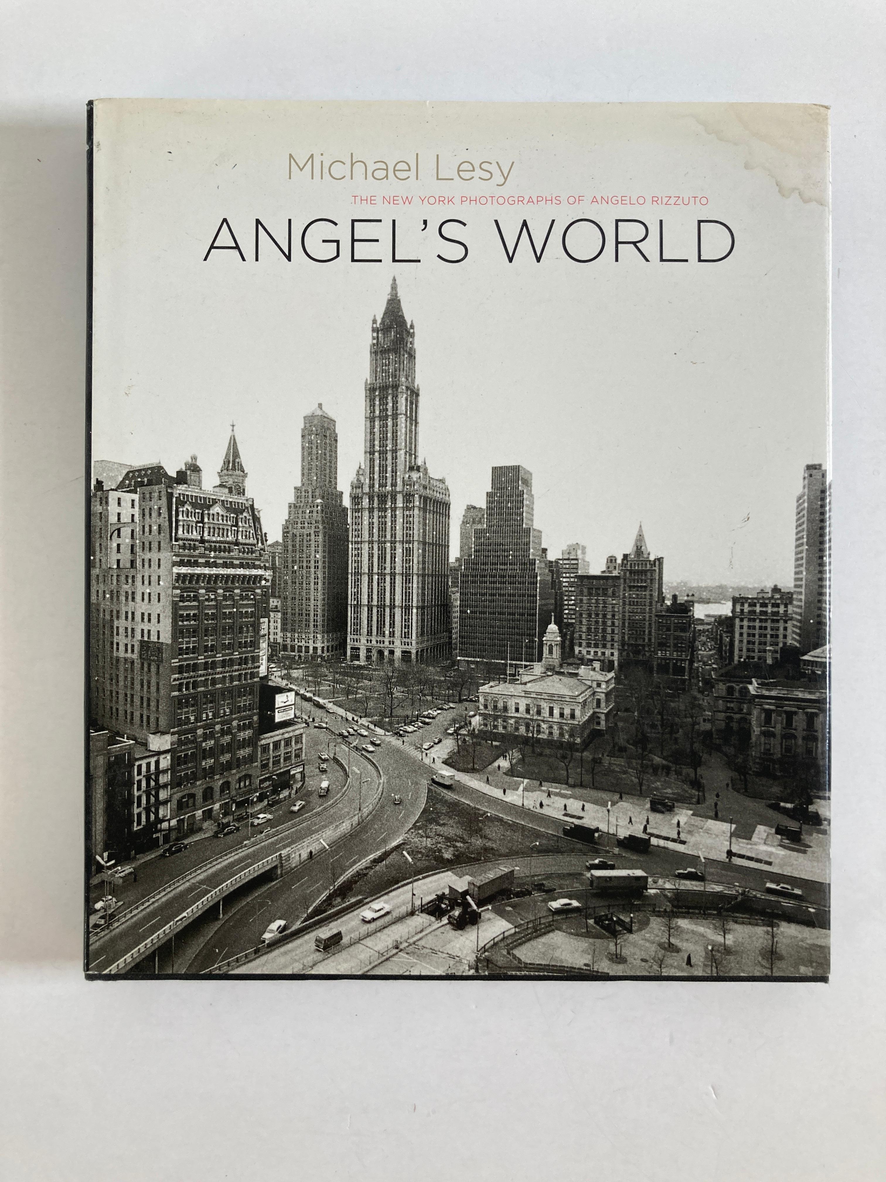 Angel's World: The New York Photographs of Angelo Rizzoto.
Lesy, Michael
First edition of this collection of photographs. Quarto, original black cloth, illustrated. Inscribed by Michael Lesy on the title page. Fine in a fine dust jacket. Jacket