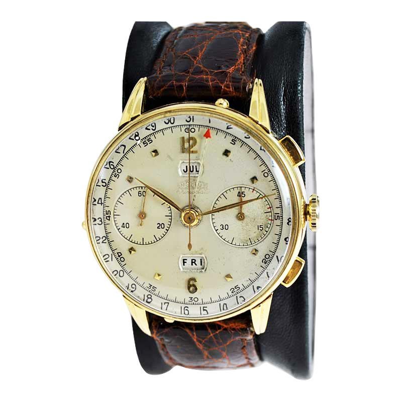 FACTORY / HOUSE: Angelus Watch Company
STYLE / REFERENCE: Chronograph / Calendar 
METAL / MATERIAL: 18Kt. Yellow Gold 
CIRCA / YEAR: 1940's
DIMENSIONS / SIZE: Length 38mm x Diameter 44mm
MOVEMENT / CALIBER: Manual Winding / 17 Jewels / Caliber