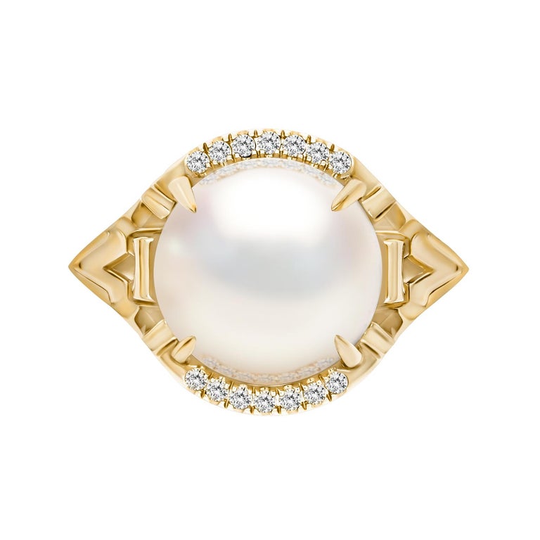 Isis Goddess White South Sea Pearl Ring mounted on an 18-Karat yellow gold and 0.65-Carat brilliant-cut white diamond setting by New York jewelry designer Angie Marei.

DETAILS

The Isis Goddess Pearl Ring by Angie Marei features a rare, exotic, and