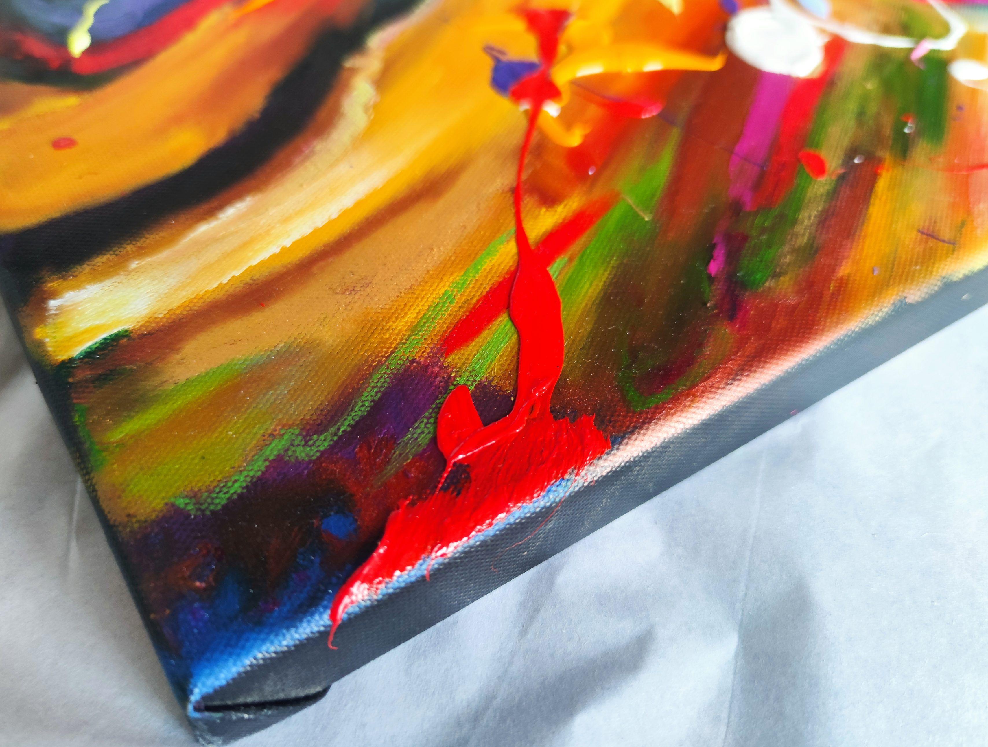 In this electrifying artwork, two mighty lions engage in a fierce battle of roars that reverberate through the canvas. On one side, a lion bursts forth with a mane ablaze in vibrant hues of sunset orange and fiery red, its jaws wide open. Facing off
