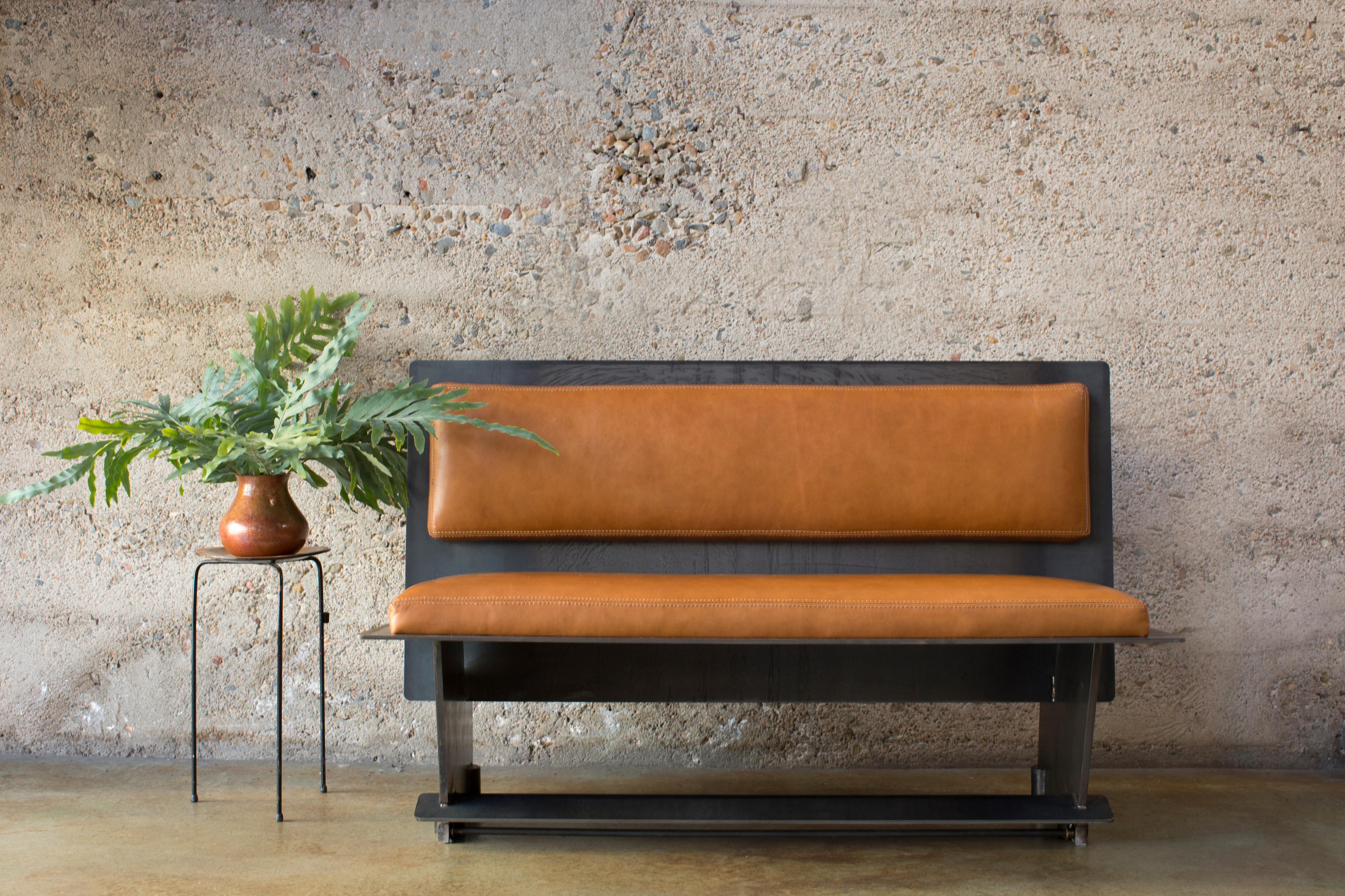 Designed by Basile Built, renowned Design-Fabrication Studio based in San Diego, California, this industrial heavy duty bench is fabricated from hot-rolled steel with leather cushions. Featuring a minimalist aesthetic, it can be used as a