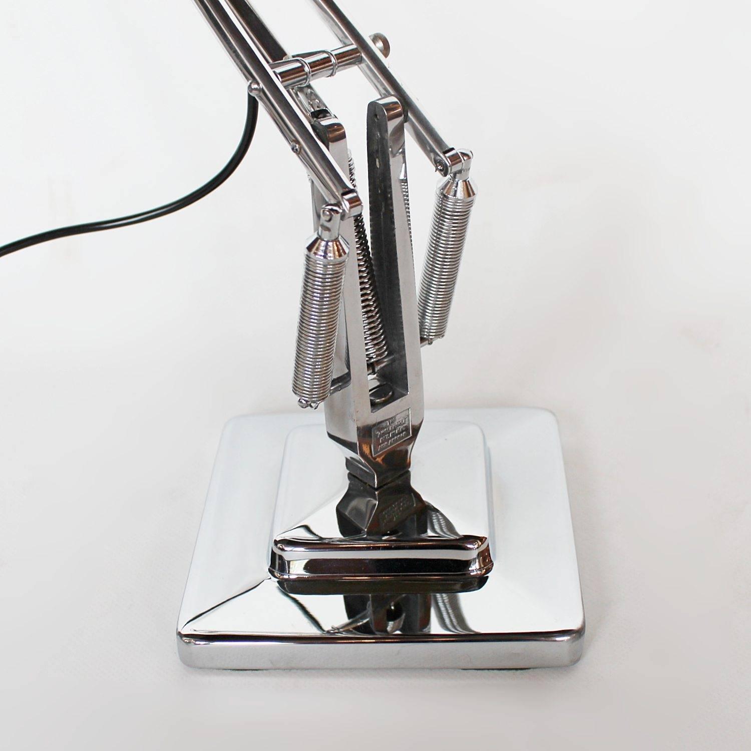 An Art Deco, chromed metal anglepoise desk lamp by Herbert Terry & Sons. With a two-step base. Original stamps to stem.

Fully refurbished, re-wired, stripped and re-chromed. Some replacement parts

Dimensions: Base W 15cm, D 15cm, L arm