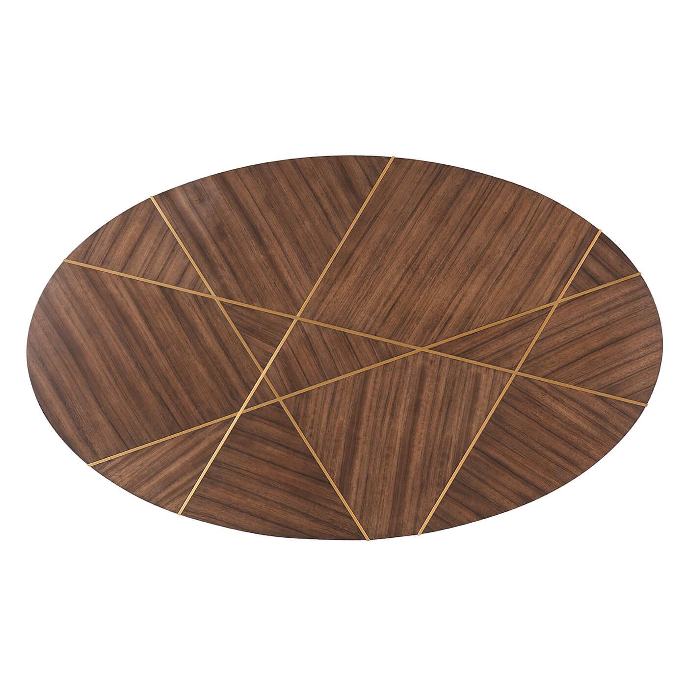 Modern coffee table with an angled edge oval slab top, with intersecting brass inlaid relief lines on an angled brass finish steel base.

Dimensions: 56