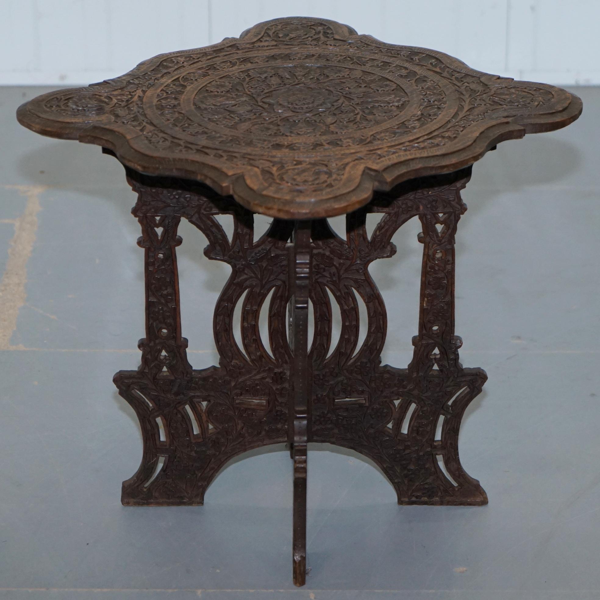 We are delighted to offer for sale this stunning hand carved Anglo Burmese 19th century hardwood side table

A very good looking well made and decorative table, its hand carved from head to toe and looks like pure art furniture from every angle

We