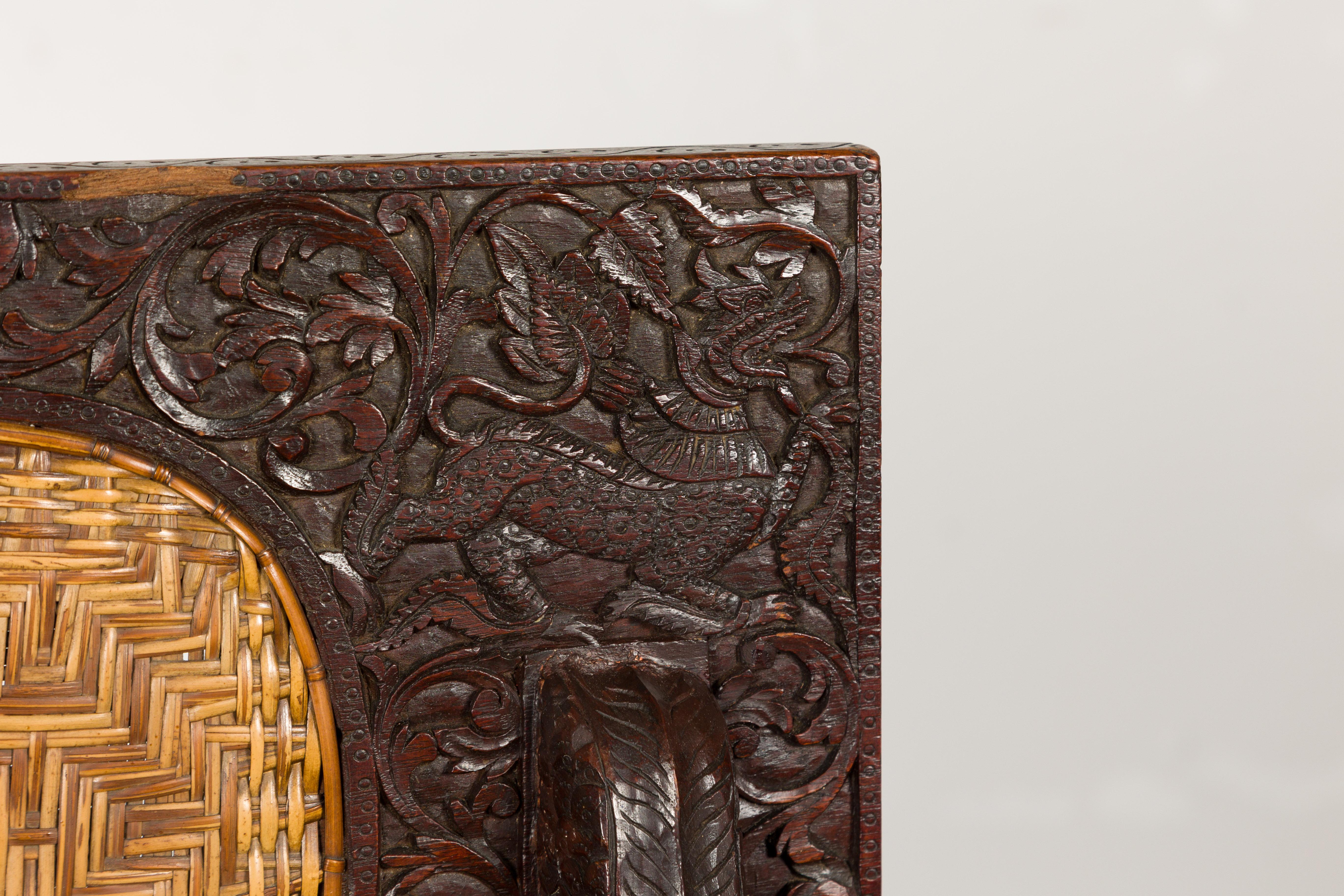 Anglo-Indian 1900 Armchair with Carved Back, Mythical Creatures and Woven Rattan For Sale 2