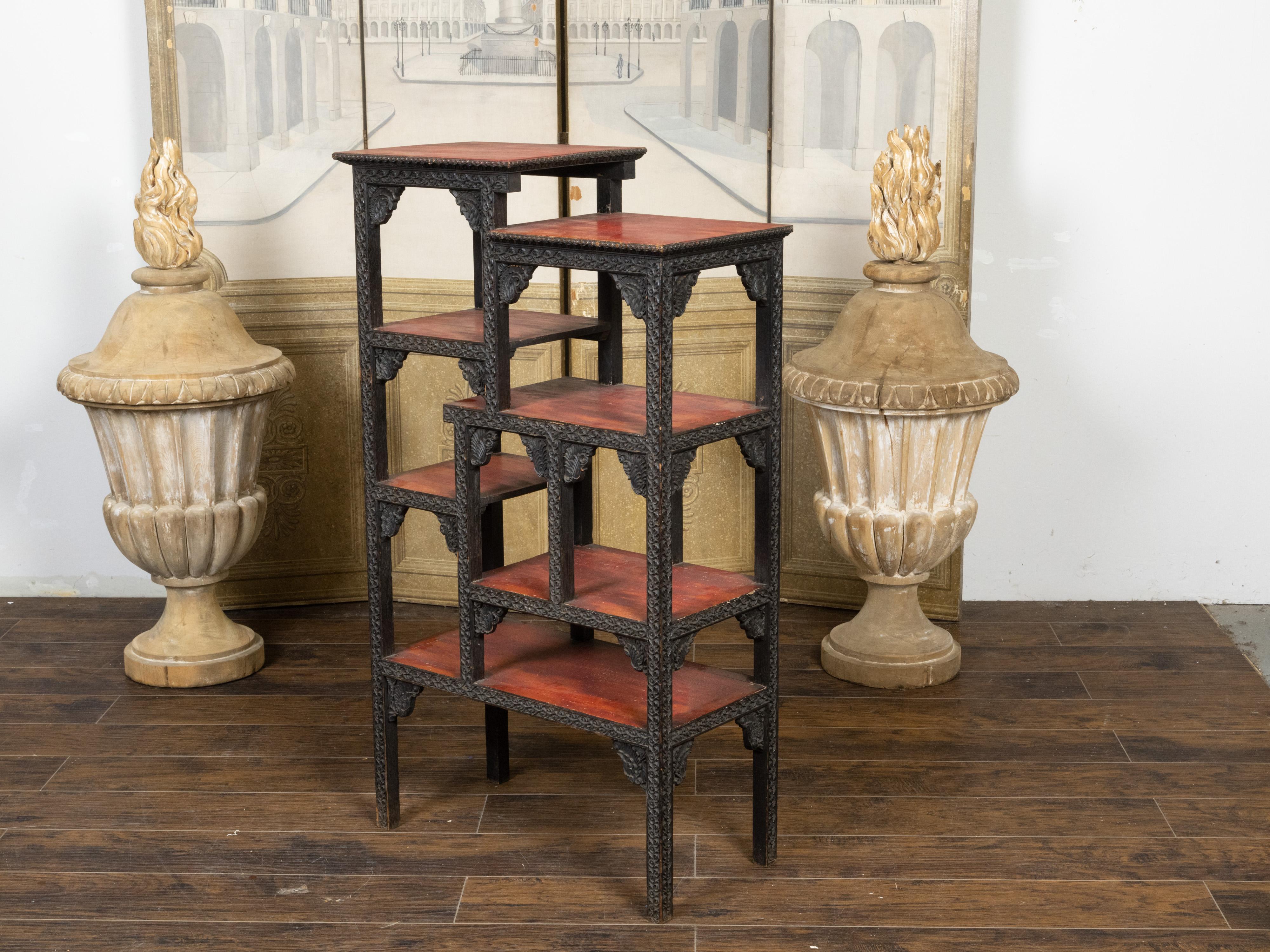 Anglo-Indian 1930s Black Painted Tiered Shelf with Carved Scrolling Foliage In Good Condition For Sale In Atlanta, GA