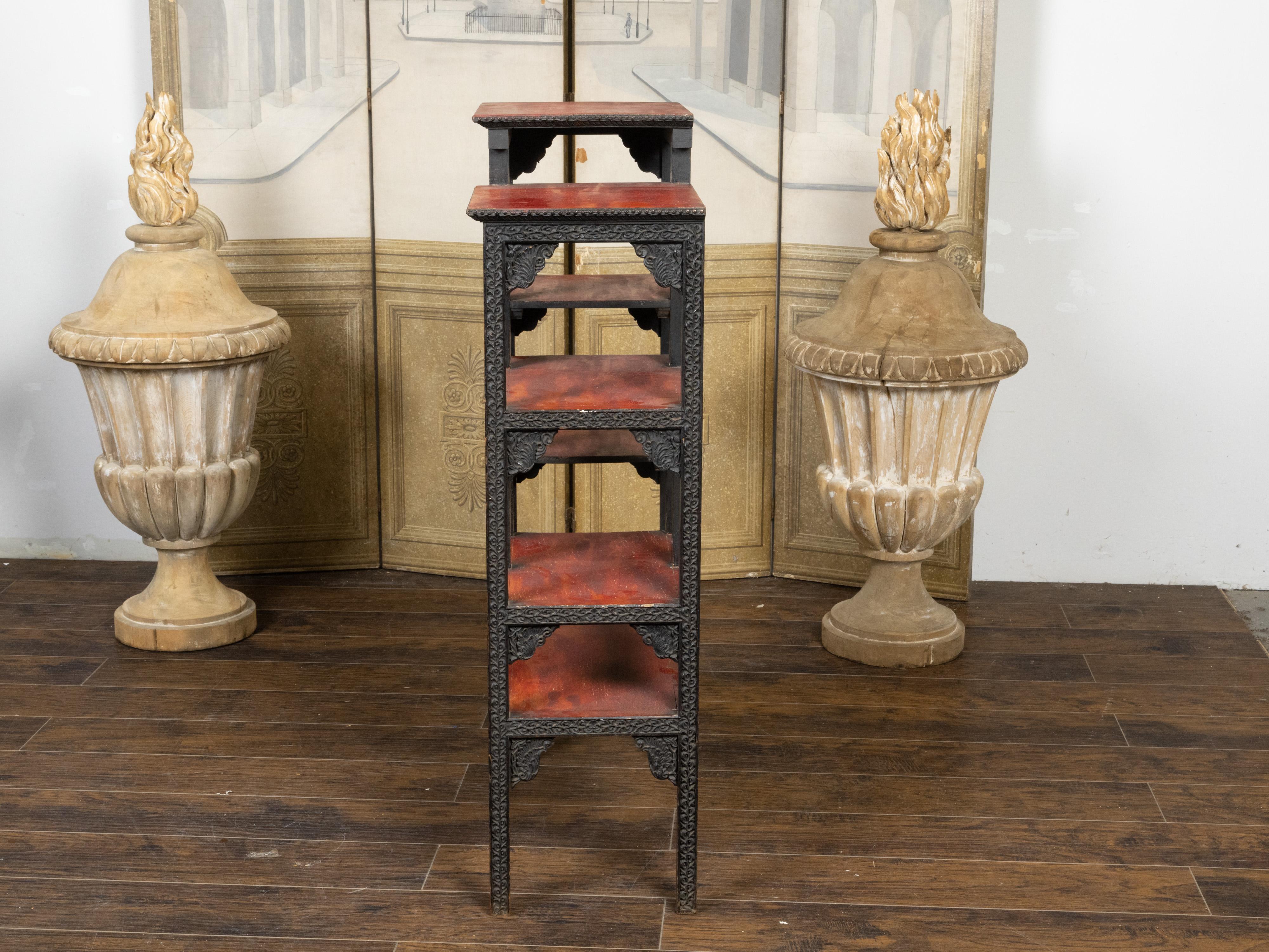 20th Century Anglo-Indian 1930s Black Painted Tiered Shelf with Carved Scrolling Foliage For Sale