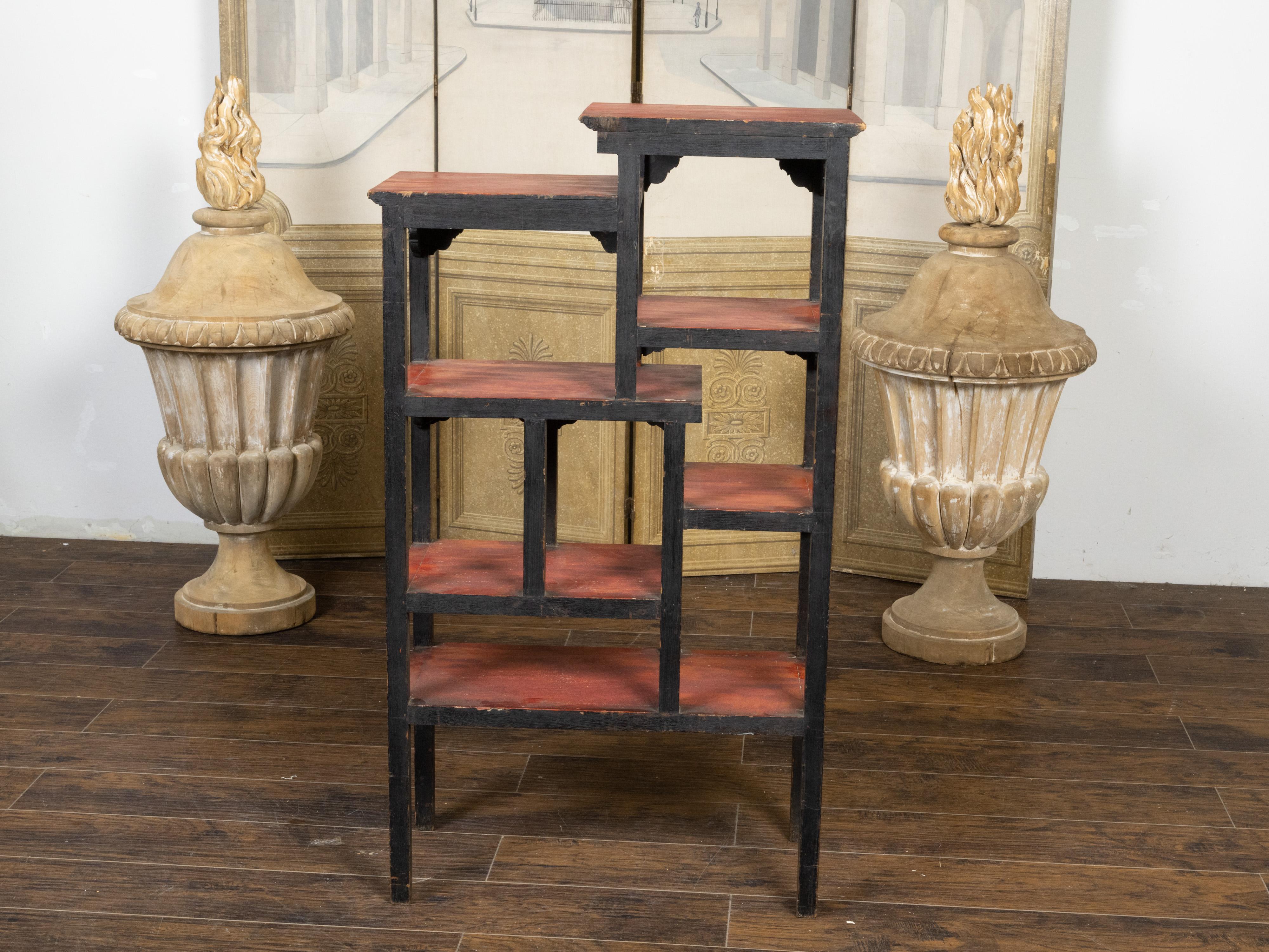 Wood Anglo-Indian 1930s Black Painted Tiered Shelf with Carved Scrolling Foliage For Sale