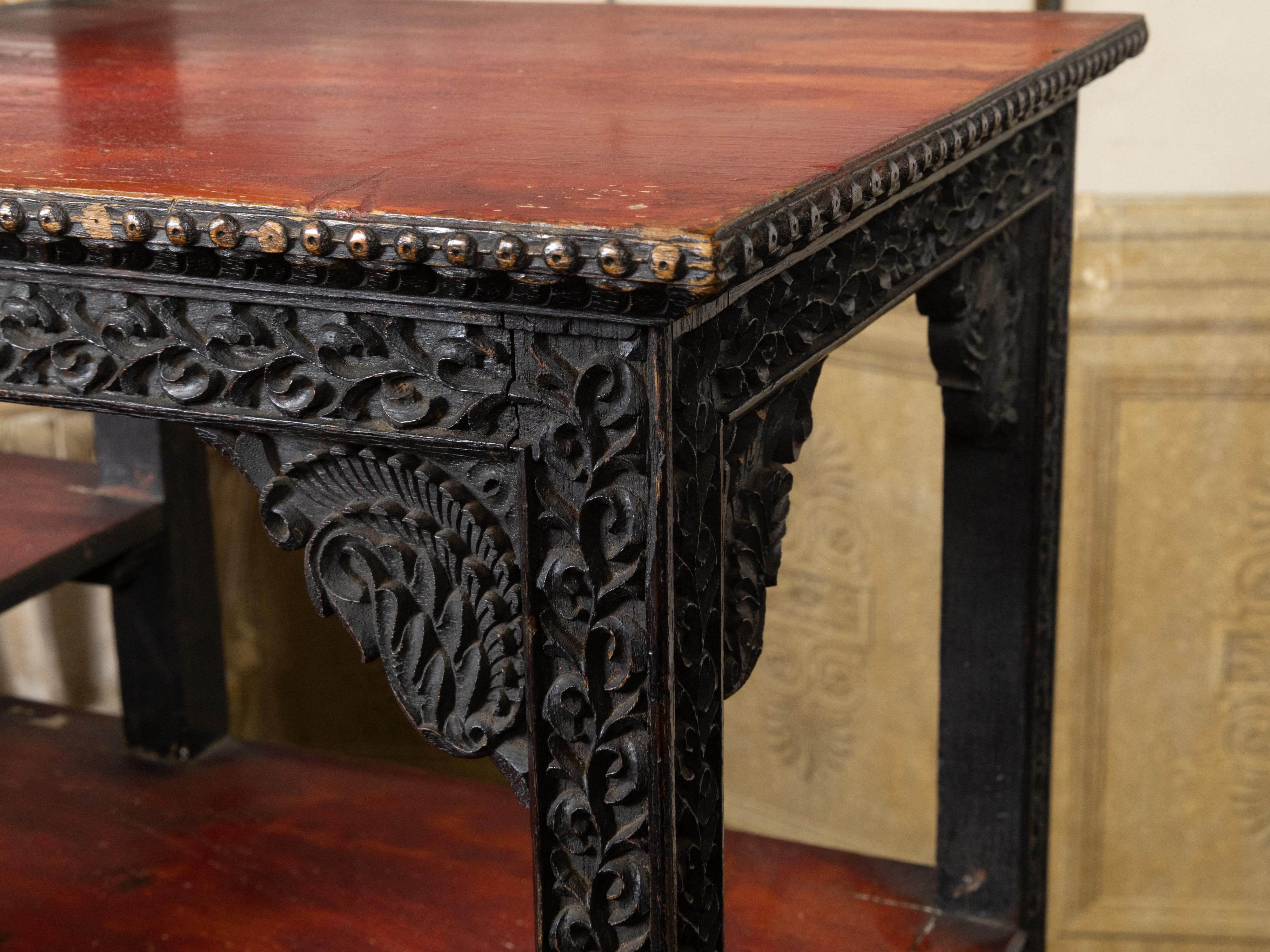 Anglo-Indian 1930s Black Painted Tiered Shelf with Carved Scrolling Foliage For Sale 3