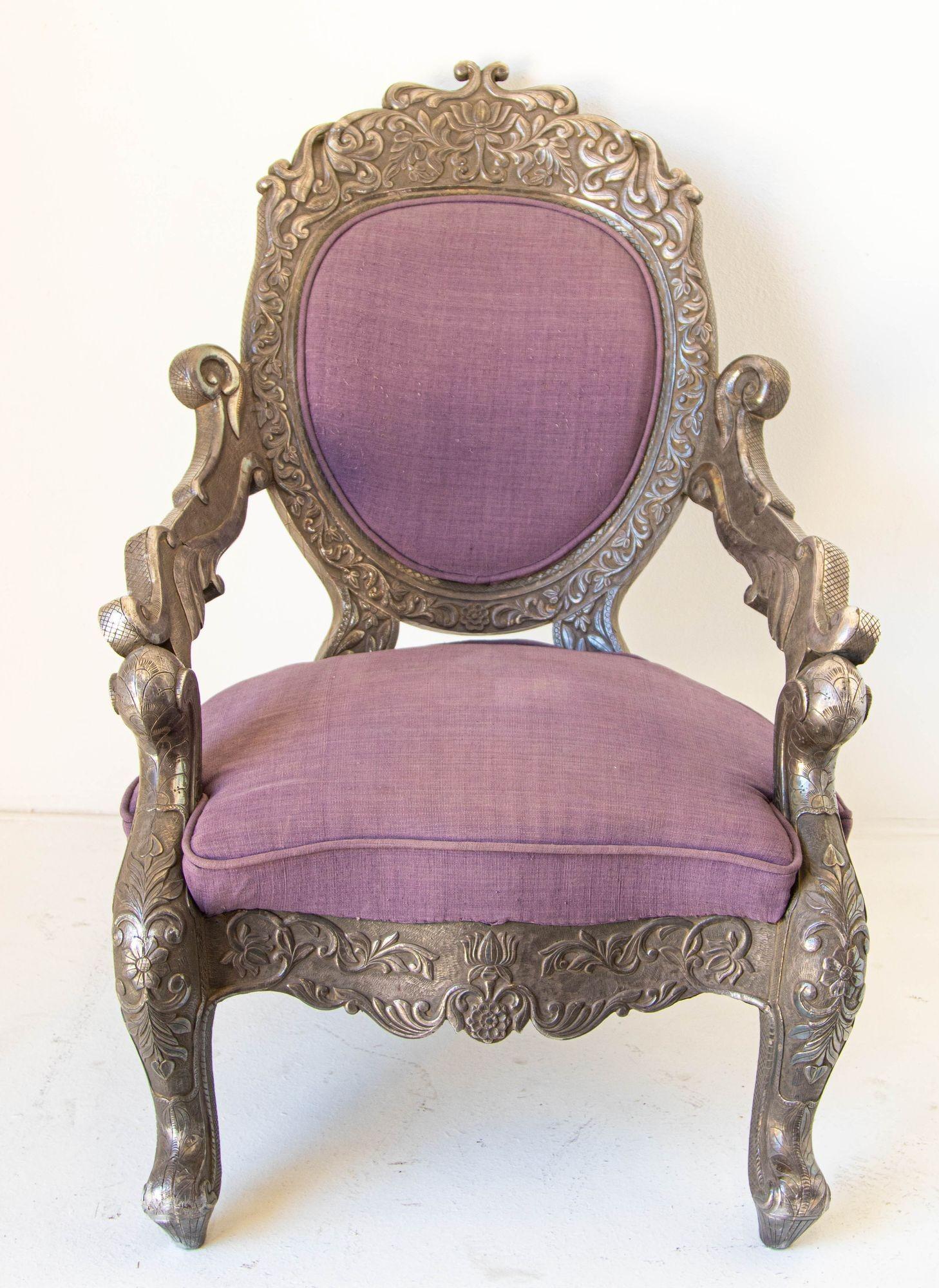 Antique Anglo Indian Armchair Throne Silver Embossed Throne late 19th Century.
Anglo-Indian silver embossed throne chair, the detailed silvered metal chair frame has been hammered and embosses to create beautiful Indian floral motifs.
A very