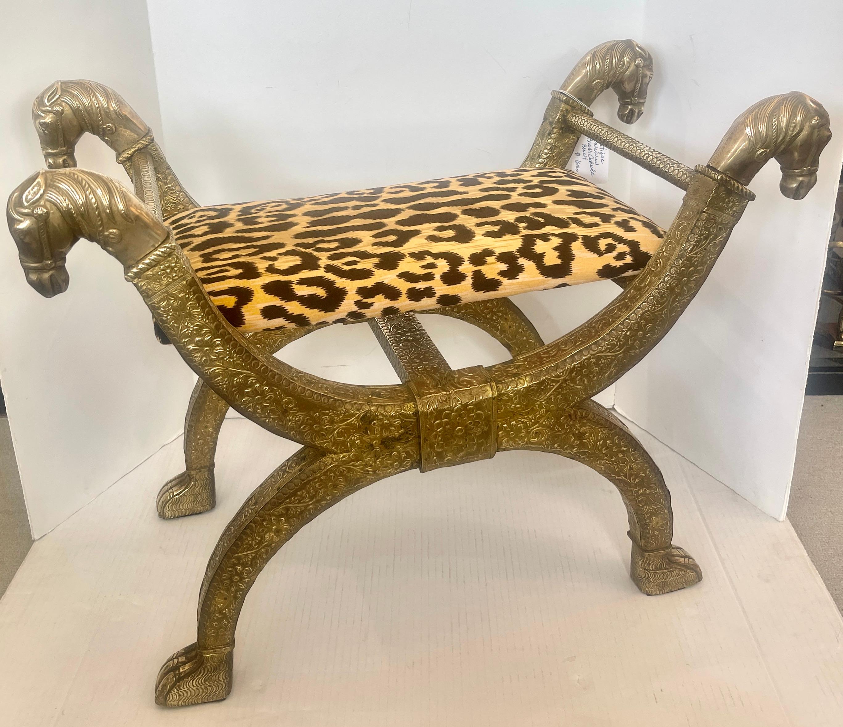 This is a stunning Anglo Indian from East Asia,  Brass-clad Embossed  Wood Stool, With Horse Heads.
Great details throughout the Clad Brass,  ending at the top with highly detailed Horse heads.
These were also called Saddle stools.
The Velvet Animal