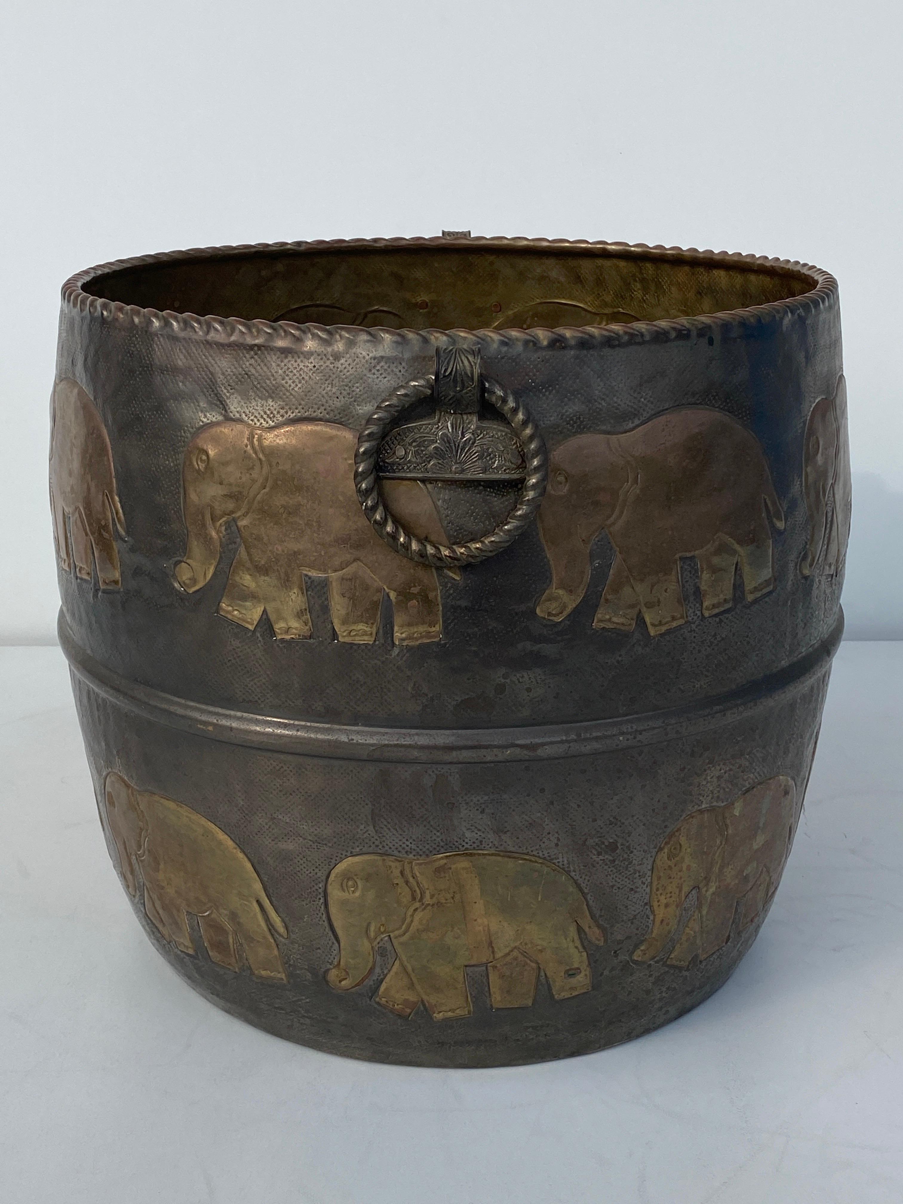 Anglo Indian style brass planter with elephant motif.