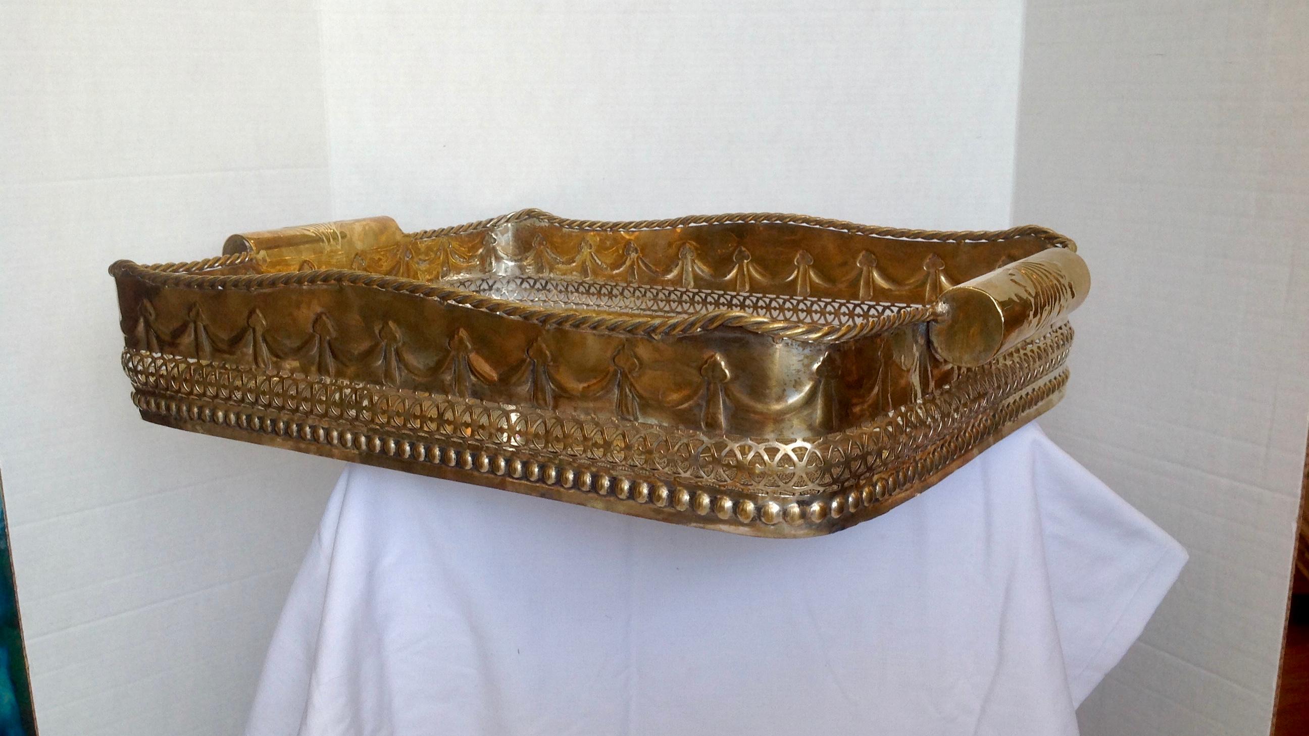 Large and impressive: fashioned with a gold wash and artistically decorated with
extensive and elaborate embossing.