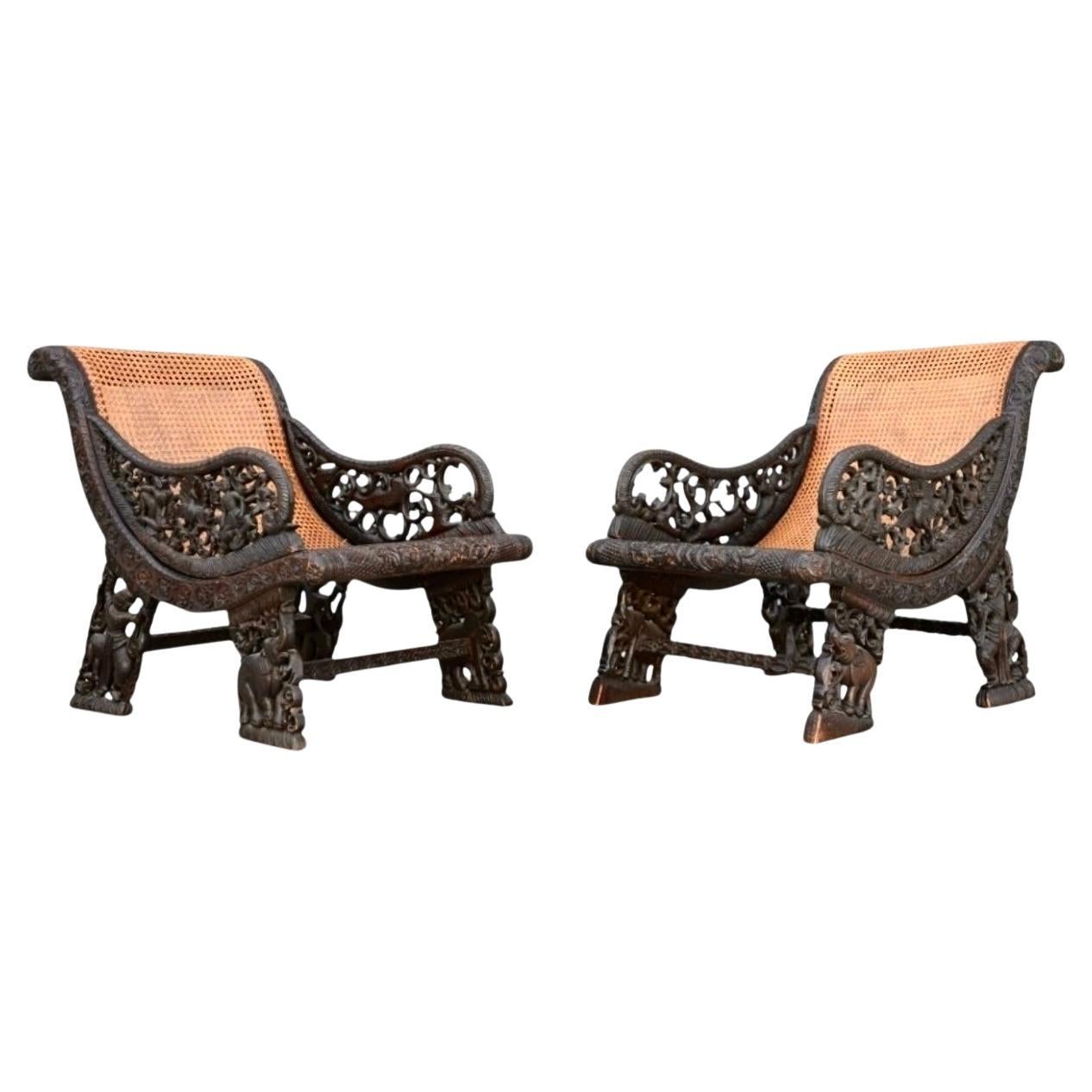 Anglo Indian Carved Reclining Armchairs, a Pair