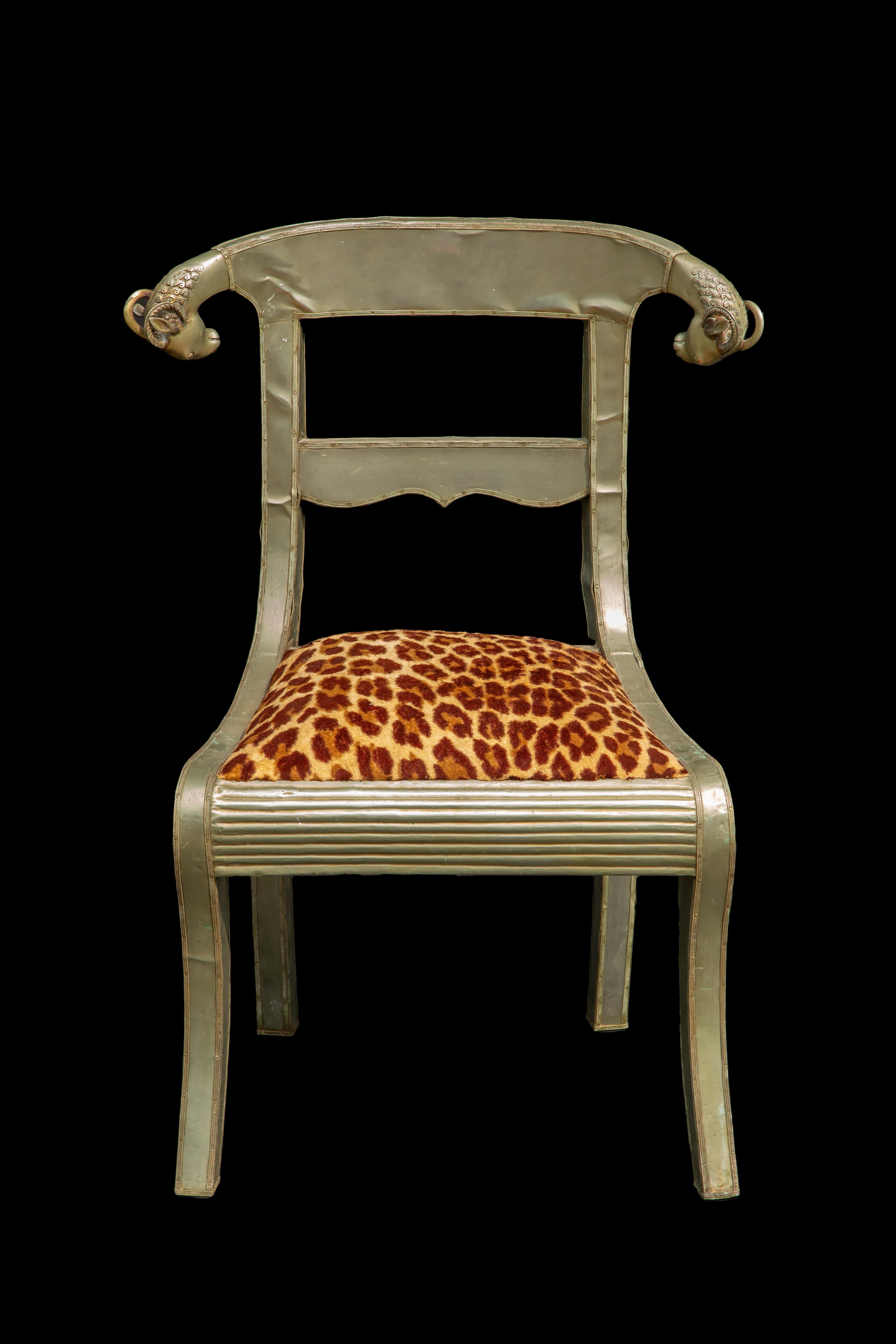Anglo-Indian Dowry Chair: Regal Silvered Elegance w Rams' Heads & Leopard Seat In Good Condition For Sale In New York, NY