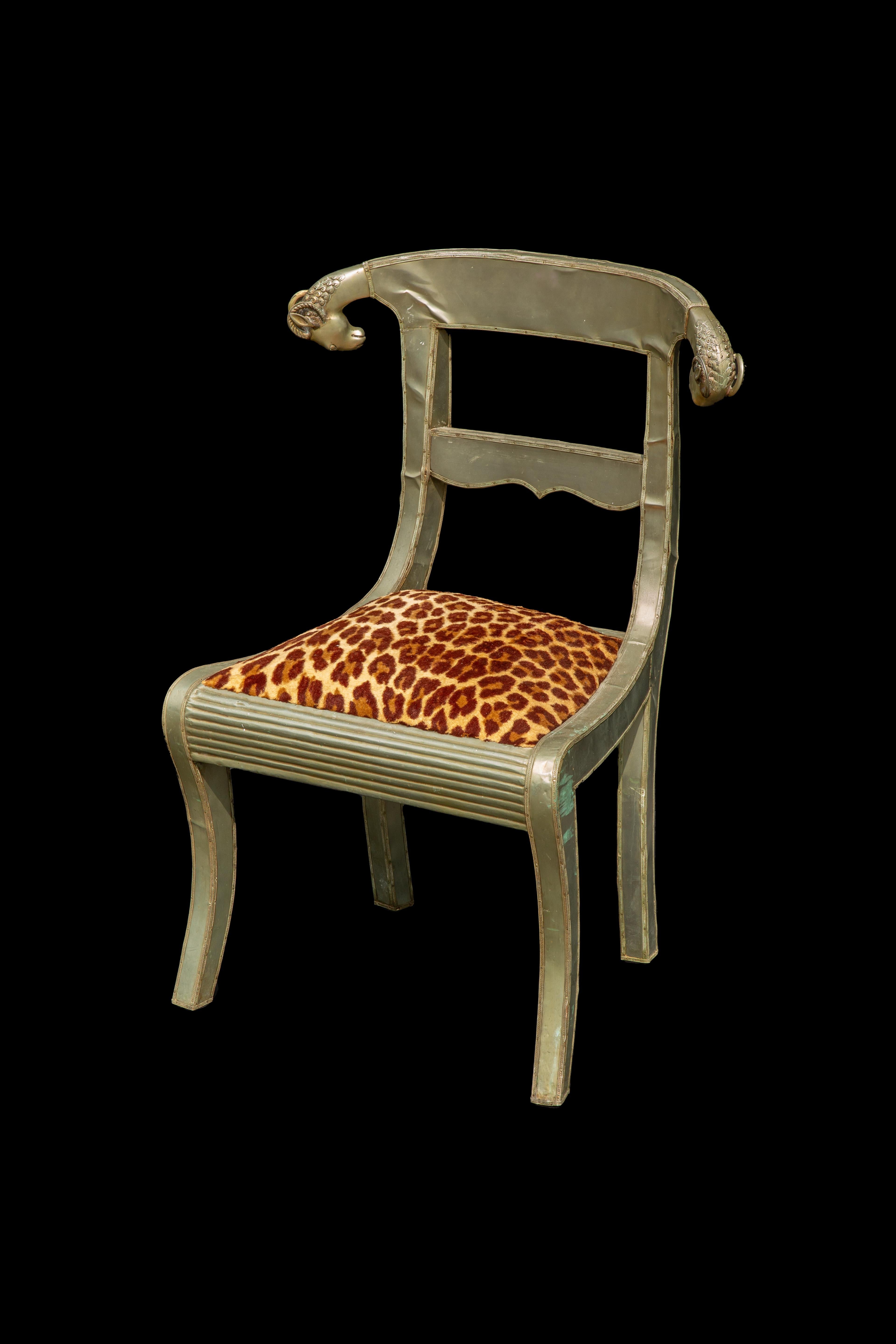 20th Century Anglo-Indian Dowry Chair: Regal Silvered Elegance w Rams' Heads & Leopard Seat For Sale