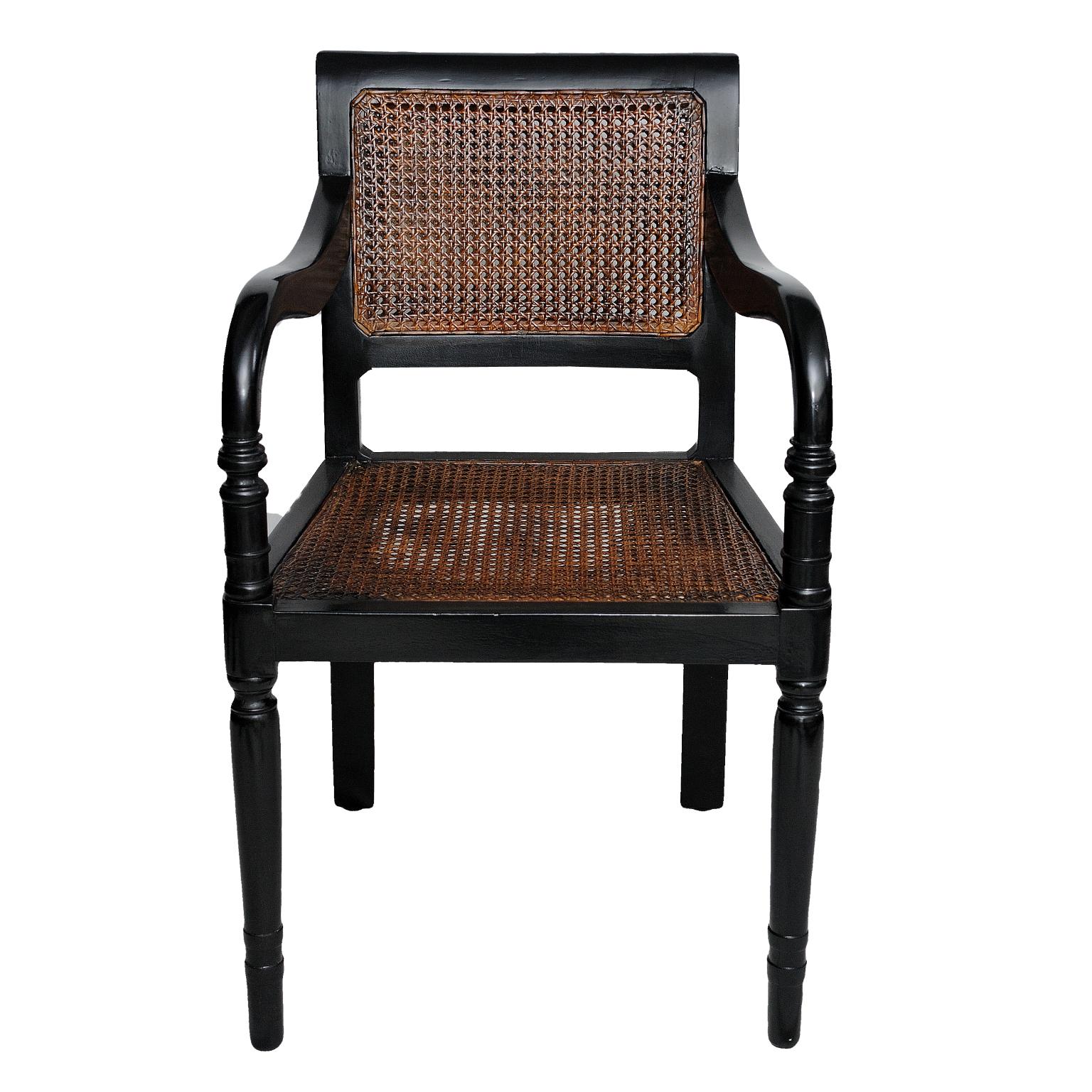 This is a lovely Anglo Indian ebonized desk/open armchair with cane work in beautiful mint condition, circa 1880.