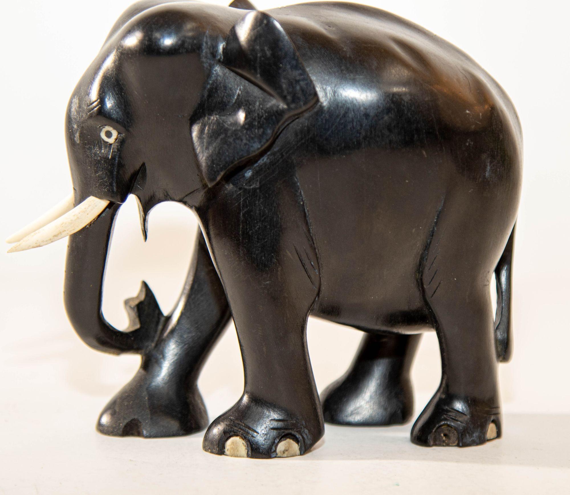 ebony elephants with ivory tusks value