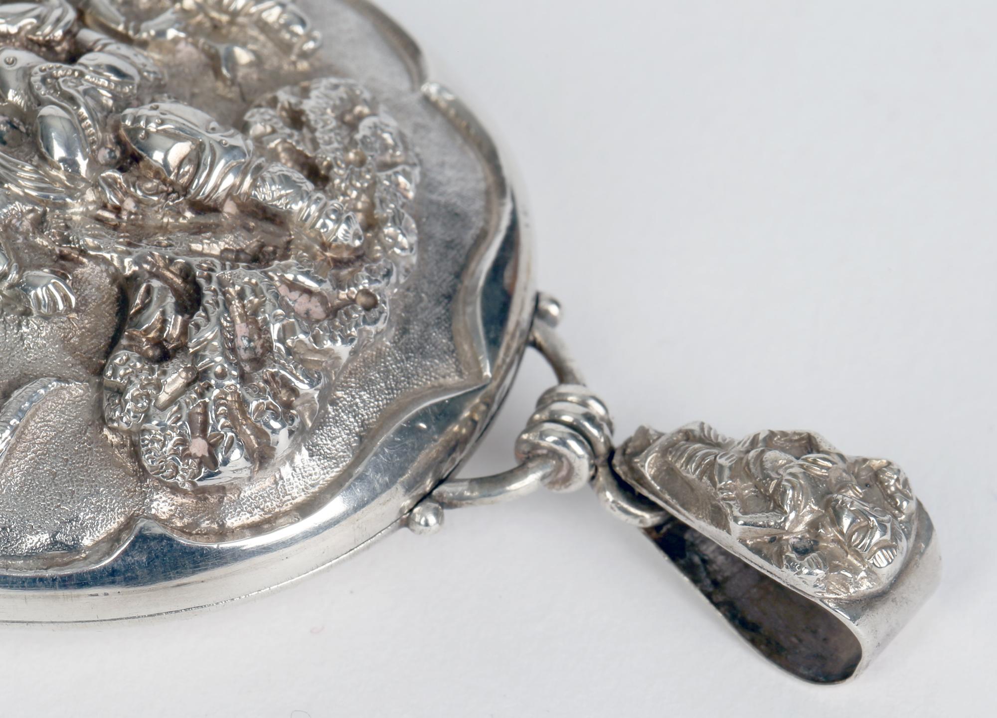 Late 19th Century Anglo Indian Fine Large Silver Embossed Deity Oval Locket Dated 1880 For Sale
